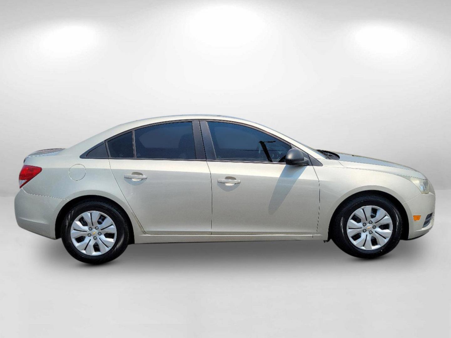 2013 Champagne Silver Metallic /Jet Black/Medium Titanium Chevrolet Cruze LS (1G1PA5SH9D7) with an Gas I4 1.8L/110 engine, 6-Speed Automatic transmission, located at 3959 U.S. 80 W, Phenix City, AL, 36870, (334) 297-4885, 32.469296, -85.135185 - 2013 Chevrolet Cruze LS - Photo#2