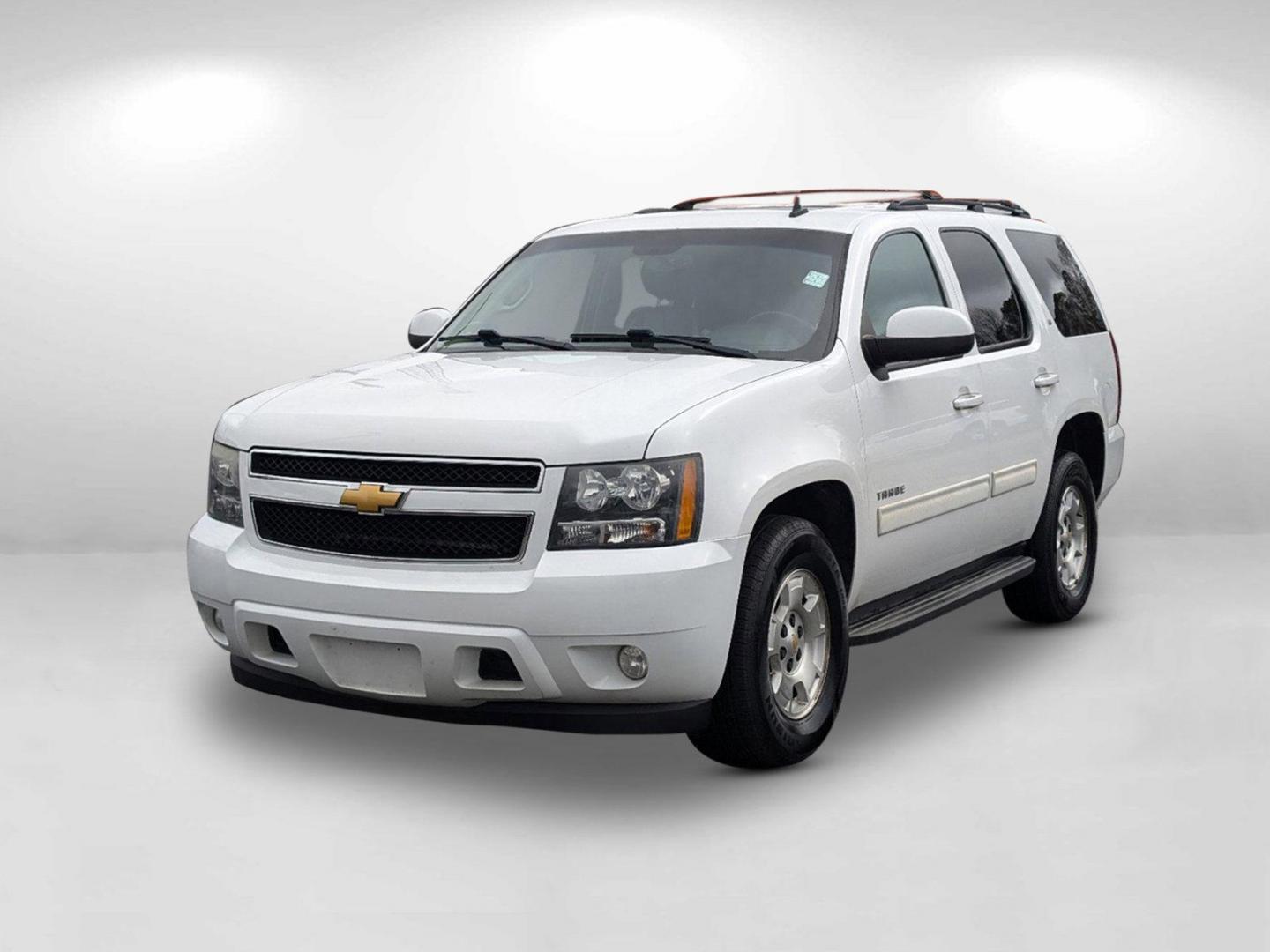 2013 /Ebony Chevrolet Tahoe LT (1GNSCBE00DR) with an Gas/Ethanol V8 5.3L/323 engine, 6-Speed Automatic transmission, located at 1430 Gateway Drive, Opelika, AL, 36801, (334) 239-0944, 32.637871, -85.409790 - 2013 Chevrolet Tahoe LT - Photo#0