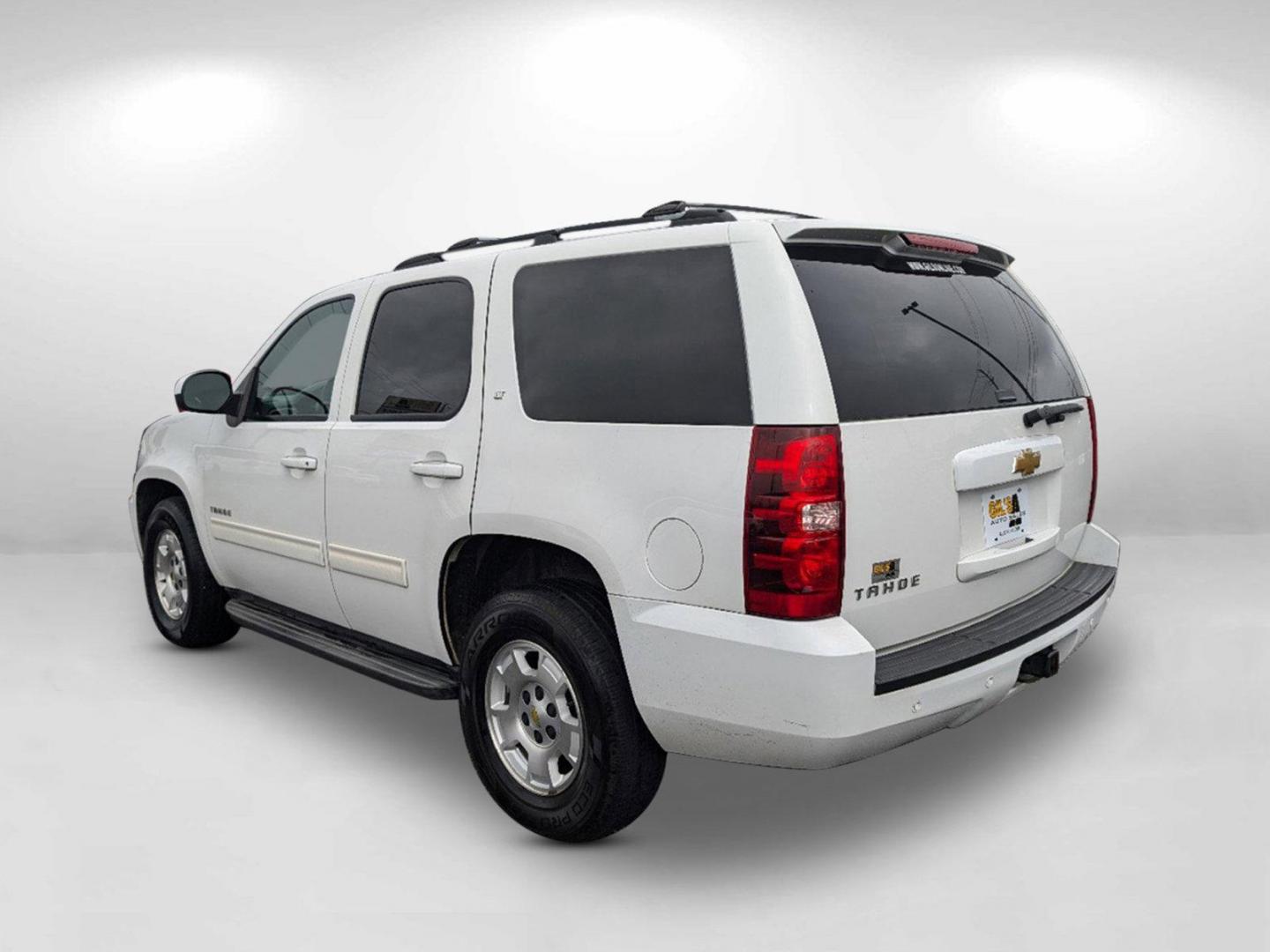 2013 /Ebony Chevrolet Tahoe LT (1GNSCBE00DR) with an Gas/Ethanol V8 5.3L/323 engine, 6-Speed Automatic transmission, located at 1430 Gateway Drive, Opelika, AL, 36801, (334) 239-0944, 32.637871, -85.409790 - 2013 Chevrolet Tahoe LT - Photo#6