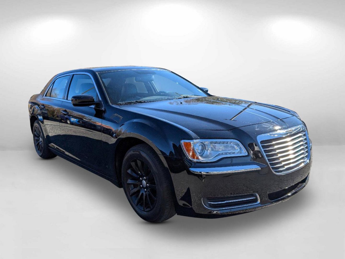 2013 /Black Chrysler 300 (2C3CCAAG8DH) with an Gas/Ethanol V6 3.6L/220 engine, 8-Speed Automatic transmission, located at 804 22nd Ave, Phenix City, AL, 36870, (334) 297-1860, 32.484749, -85.024475 - 2013 Chrysler 300 - Photo#2