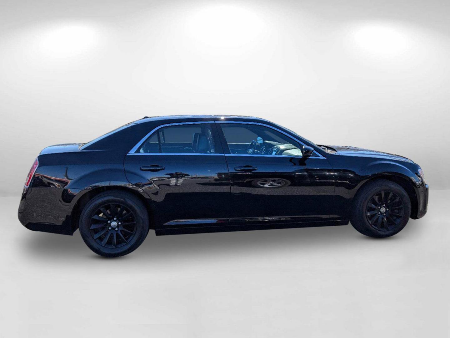 2013 /Black Chrysler 300 (2C3CCAAG8DH) with an Gas/Ethanol V6 3.6L/220 engine, 8-Speed Automatic transmission, located at 804 22nd Ave, Phenix City, AL, 36870, (334) 297-1860, 32.484749, -85.024475 - 2013 Chrysler 300 - Photo#3