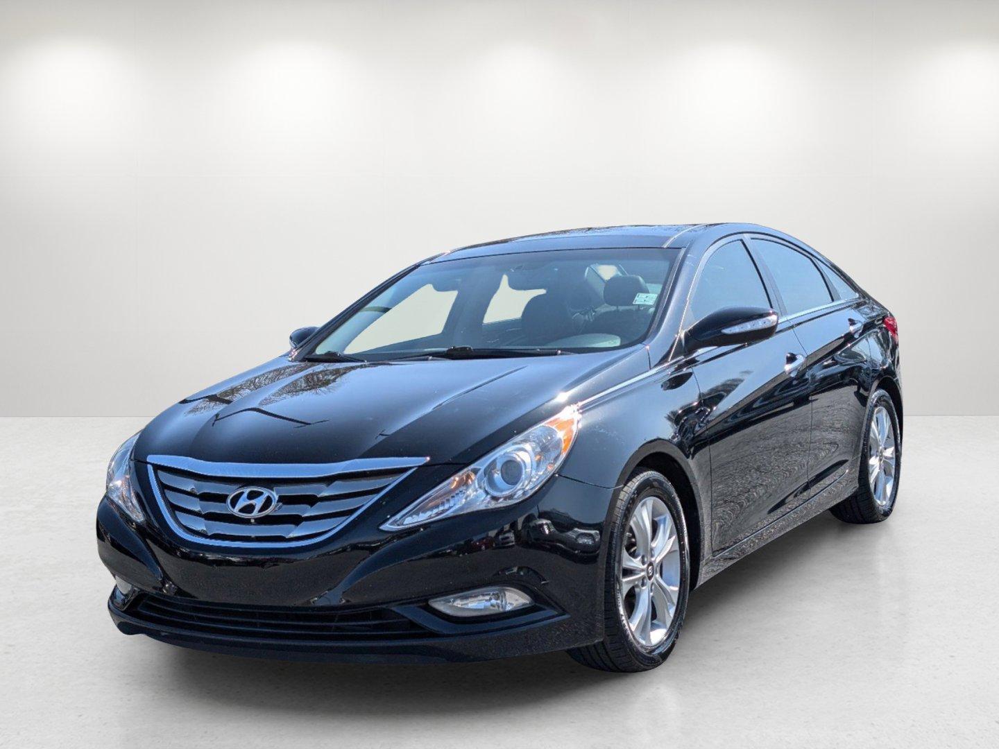 2013 /Black Hyundai Sonata Limited PZEV (5NPEC4AC1DH) with an Gas I4 2.4L/144 engine, 6-Speed Automatic w/Manual Shift transmission, located at 7000 Northlake Connector, Columbus, GA, 31904, (706) 987-8085, 32.524975, -84.978134 - 2013 Hyundai Sonata Limited PZEV - Photo#0