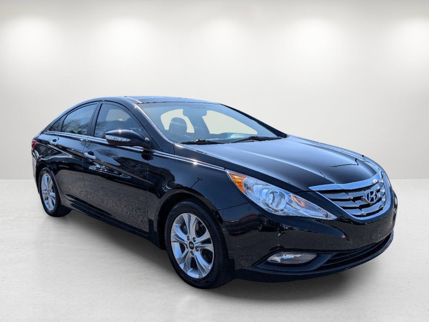 2013 /Black Hyundai Sonata Limited PZEV (5NPEC4AC1DH) with an Gas I4 2.4L/144 engine, 6-Speed Automatic w/Manual Shift transmission, located at 7000 Northlake Connector, Columbus, GA, 31904, (706) 987-8085, 32.524975, -84.978134 - 2013 Hyundai Sonata Limited PZEV - Photo#2