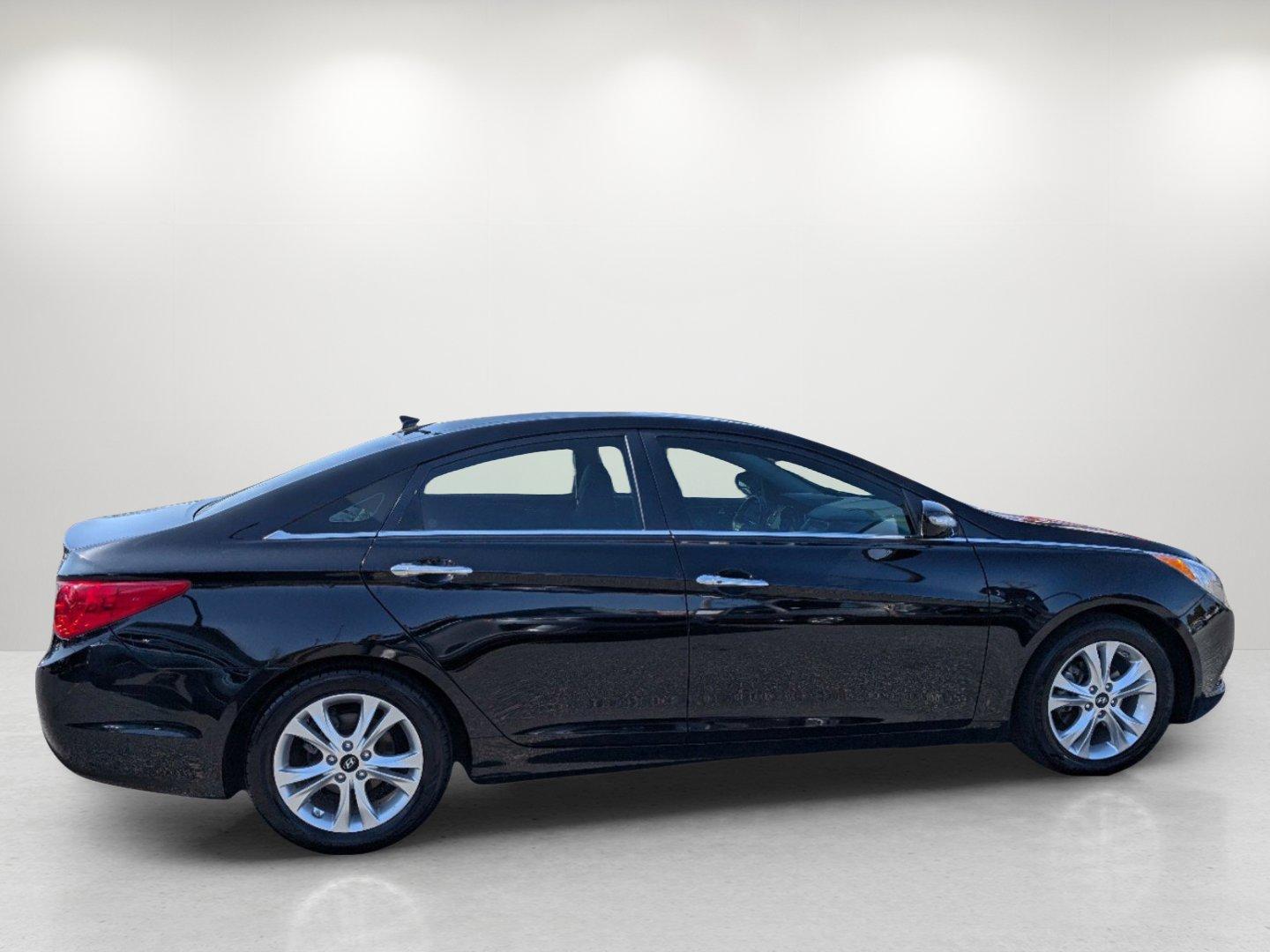 2013 /Black Hyundai Sonata Limited PZEV (5NPEC4AC1DH) with an Gas I4 2.4L/144 engine, 6-Speed Automatic w/Manual Shift transmission, located at 7000 Northlake Connector, Columbus, GA, 31904, (706) 987-8085, 32.524975, -84.978134 - 2013 Hyundai Sonata Limited PZEV - Photo#3