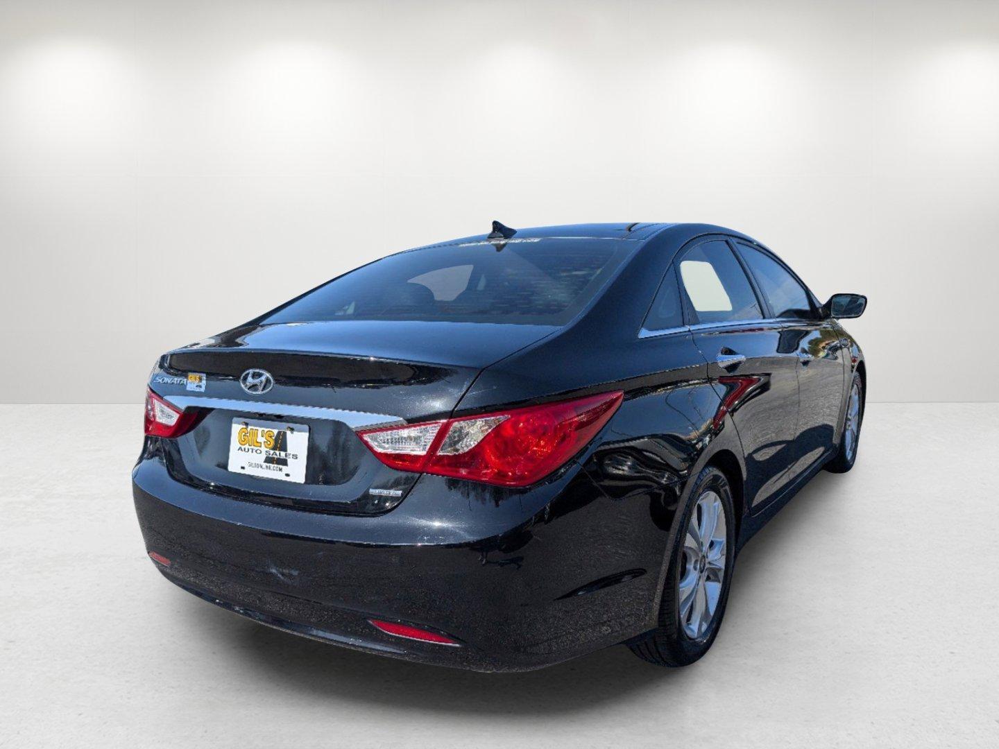 2013 /Black Hyundai Sonata Limited PZEV (5NPEC4AC1DH) with an Gas I4 2.4L/144 engine, 6-Speed Automatic w/Manual Shift transmission, located at 7000 Northlake Connector, Columbus, GA, 31904, (706) 987-8085, 32.524975, -84.978134 - 2013 Hyundai Sonata Limited PZEV - Photo#4