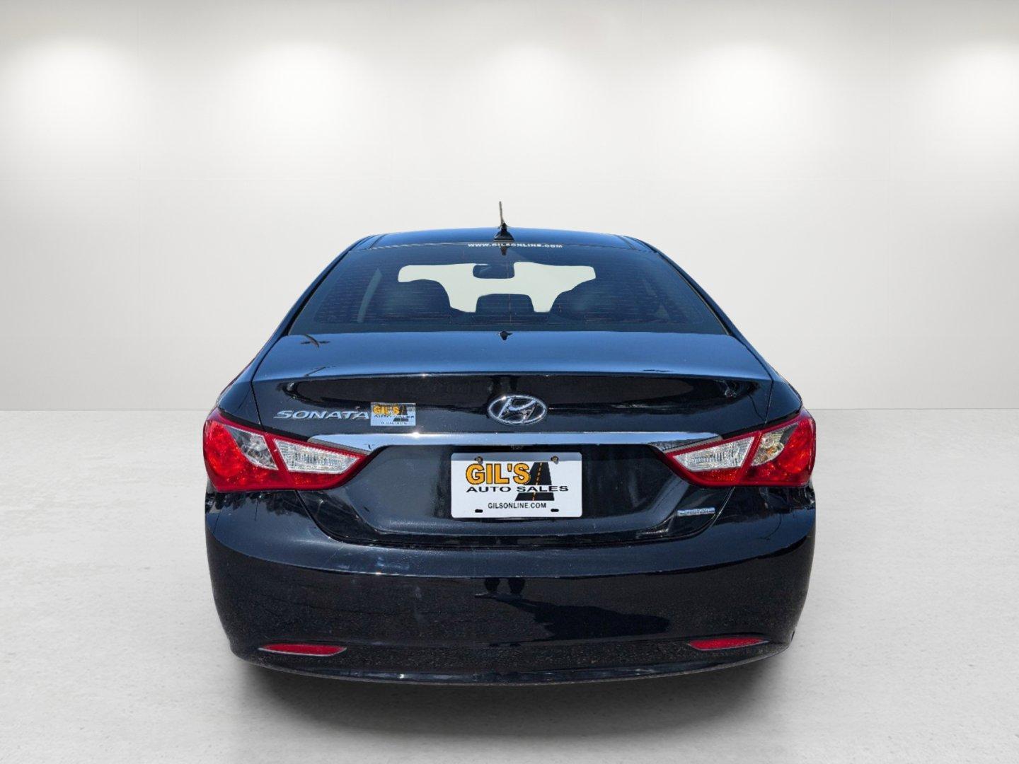 2013 /Black Hyundai Sonata Limited PZEV (5NPEC4AC1DH) with an Gas I4 2.4L/144 engine, 6-Speed Automatic w/Manual Shift transmission, located at 7000 Northlake Connector, Columbus, GA, 31904, (706) 987-8085, 32.524975, -84.978134 - 2013 Hyundai Sonata Limited PZEV - Photo#5