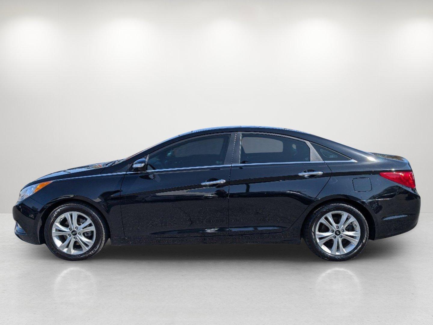 2013 /Black Hyundai Sonata Limited PZEV (5NPEC4AC1DH) with an Gas I4 2.4L/144 engine, 6-Speed Automatic w/Manual Shift transmission, located at 7000 Northlake Connector, Columbus, GA, 31904, (706) 987-8085, 32.524975, -84.978134 - 2013 Hyundai Sonata Limited PZEV - Photo#7