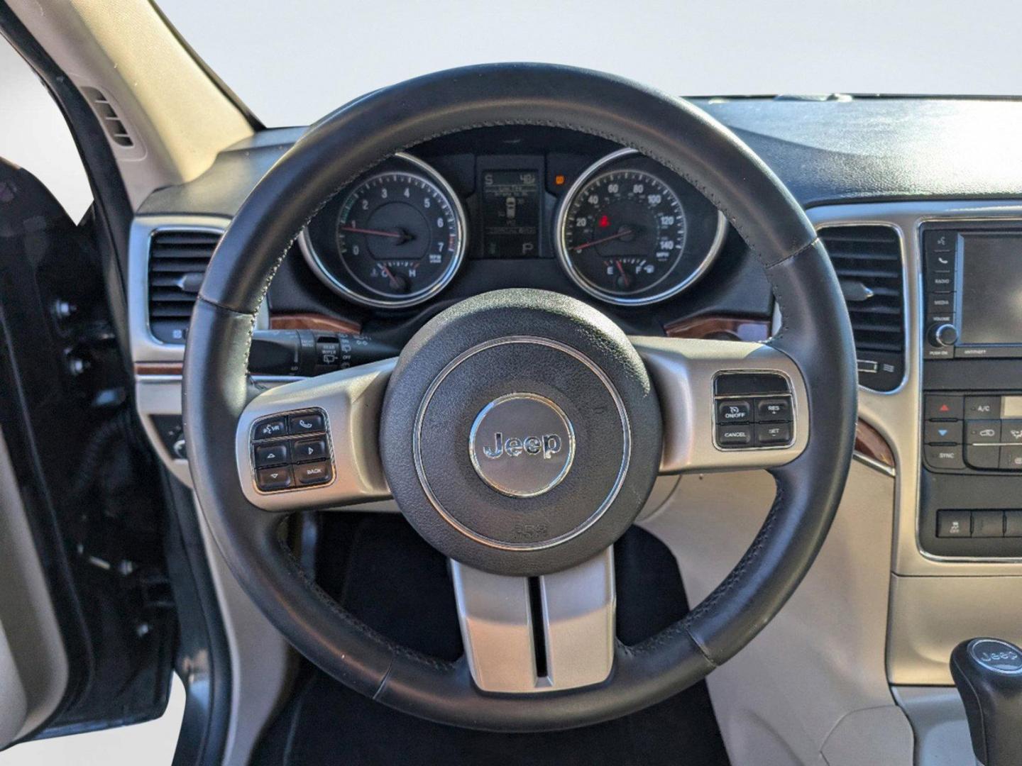 2013 /Black/Light Frost Beige Jeep Grand Cherokee Limited (1C4RJEBG8DC) with an Gas/Ethanol V6 3.6L/220 engine, 5-Speed Automatic transmission, located at 3959 U.S. 80 W, Phenix City, AL, 36870, (334) 297-4885, 32.469296, -85.135185 - 2013 Jeep Grand Cherokee Limited - Photo#13