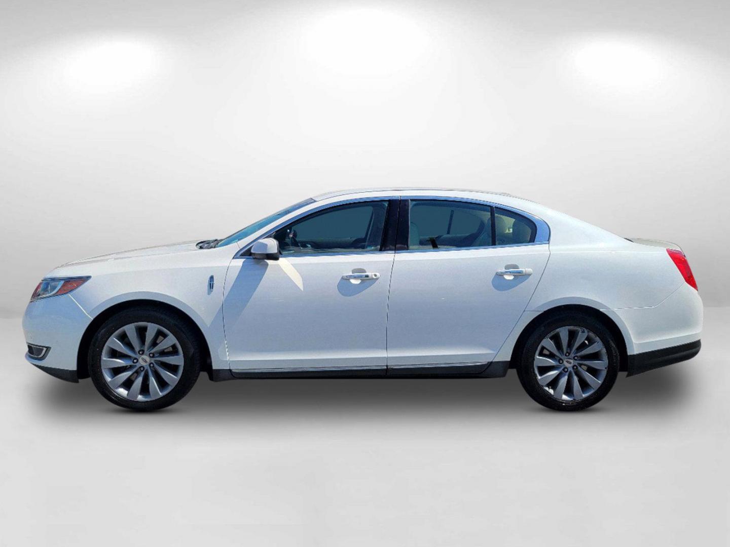 2013 White Lincoln MKS (1LNHL9DKXDG) with an Gas V6 3.7L/ engine, 6-Speed Automatic transmission, located at 7000 Northlake Connector, Columbus, GA, 31904, (706) 987-8085, 32.524975, -84.978134 - 2013 Lincoln MKS - Photo#7