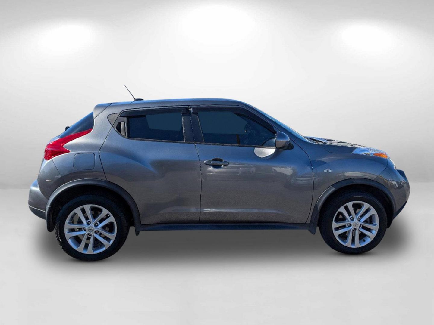 2013 /Black Nissan JUKE SL (JN8AF5MR3DT) with an Gas Turbocharged I4 1.6L/99 engine, 1-Speed Continuously Variable Ratio transmission, located at 1430 Gateway Drive, Opelika, AL, 36801, (334) 239-0944, 32.637871, -85.409790 - 2013 Nissan JUKE SL - Photo#3