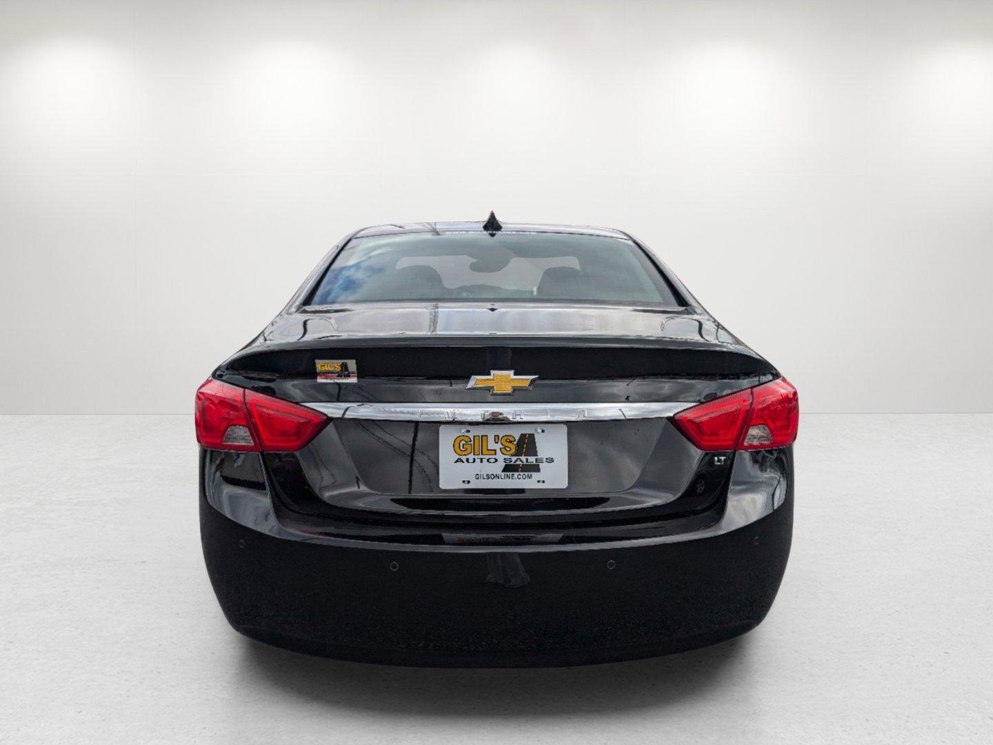 2014 /Jet Black Chevrolet Impala LT (1G1125S30EU) with an Gas/Ethanol V6 3.6L/217 engine, 6-Speed Automatic transmission, located at 1430 Gateway Drive, Opelika, AL, 36801, (334) 239-0944, 32.637871, -85.409790 - 2014 Chevrolet Impala LT - Photo#5