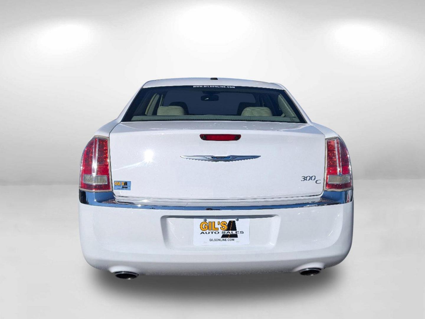 2014 /Lt Frost/Dk Frost Beige Chrysler 300 300C (2C3CCAEG5EH) with an Regular Unleaded V-6 3.6 L/220 engine, 8-Speed Automatic w/OD transmission, located at 3959 U.S. 80 W, Phenix City, AL, 36870, (334) 297-4885, 32.469296, -85.135185 - 2014 Chrysler 300 300C - Photo#7