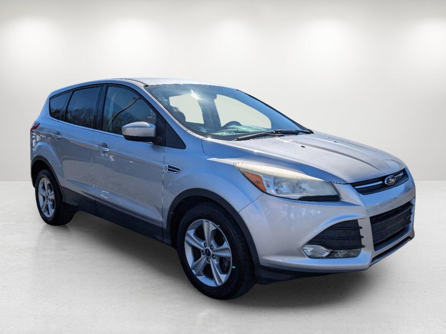 2014 Ford Escape SE (1FMCU0GX0EU) with an Intercooled Turbo Regular Unleaded I-4 1.6 L/98 engine, 6-Speed Automatic w/OD transmission, located at 804 22nd Ave, Phenix City, AL, 36870, (334) 297-1860, 32.484749, -85.024475 - 2014 Ford Escape SE - Photo#2