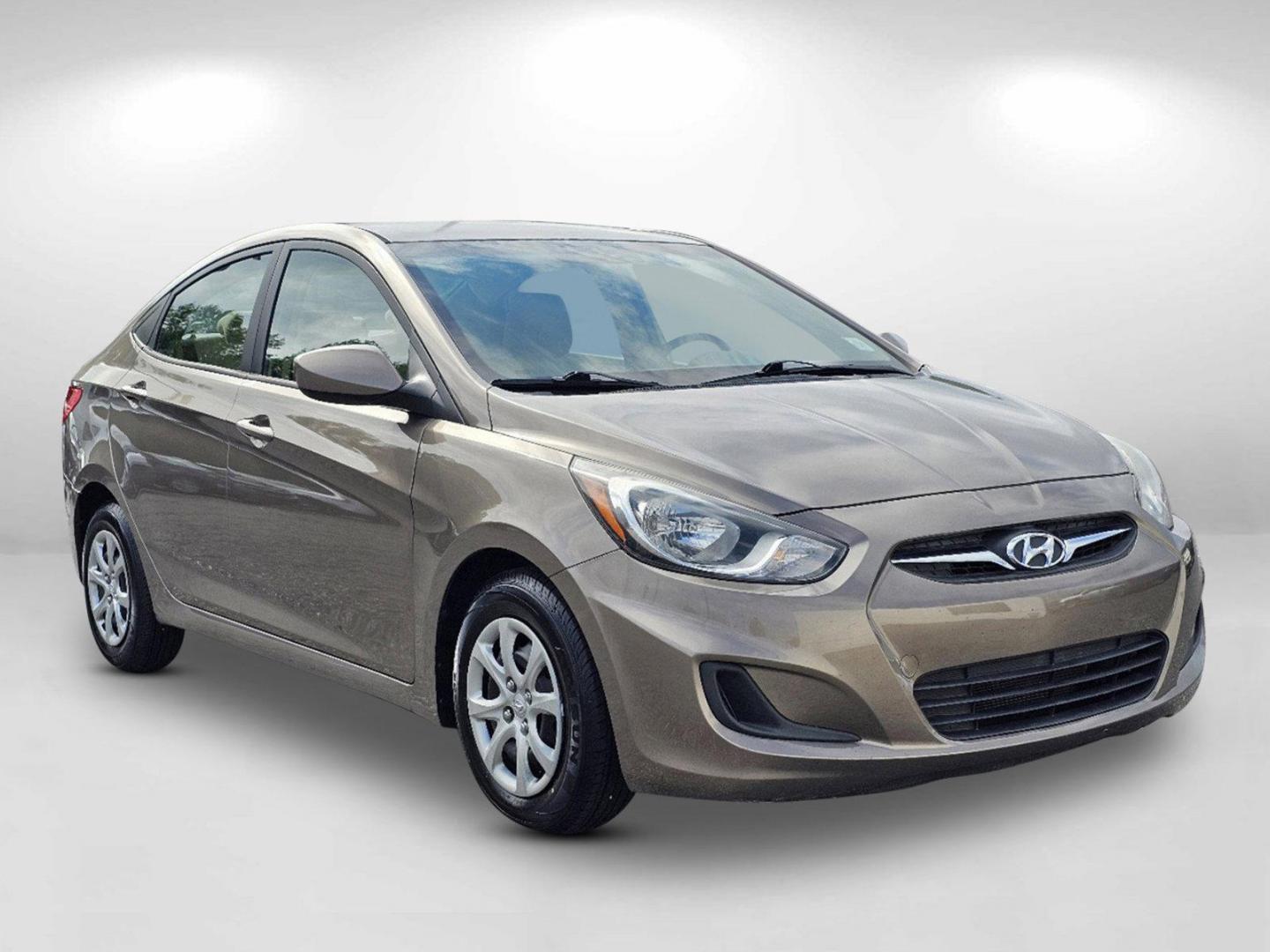 2014 Mocho Bronze Metallic /Beige Hyundai Accent GLS (KMHCT4AE4EU) with an Regular Unleaded I-4 1.6 L/97 engine, 6-Speed Automatic w/OD transmission, located at 7000 Northlake Connector, Columbus, GA, 31904, (706) 987-8085, 32.524975, -84.978134 - 2014 Hyundai Accent GLS - Photo#2