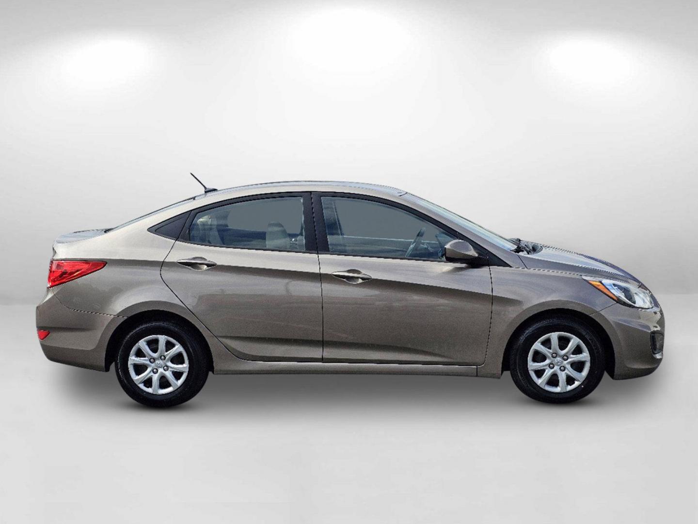 2014 Mocho Bronze Metallic /Beige Hyundai Accent GLS (KMHCT4AE4EU) with an Regular Unleaded I-4 1.6 L/97 engine, 6-Speed Automatic w/OD transmission, located at 7000 Northlake Connector, Columbus, GA, 31904, (706) 987-8085, 32.524975, -84.978134 - 2014 Hyundai Accent GLS - Photo#3