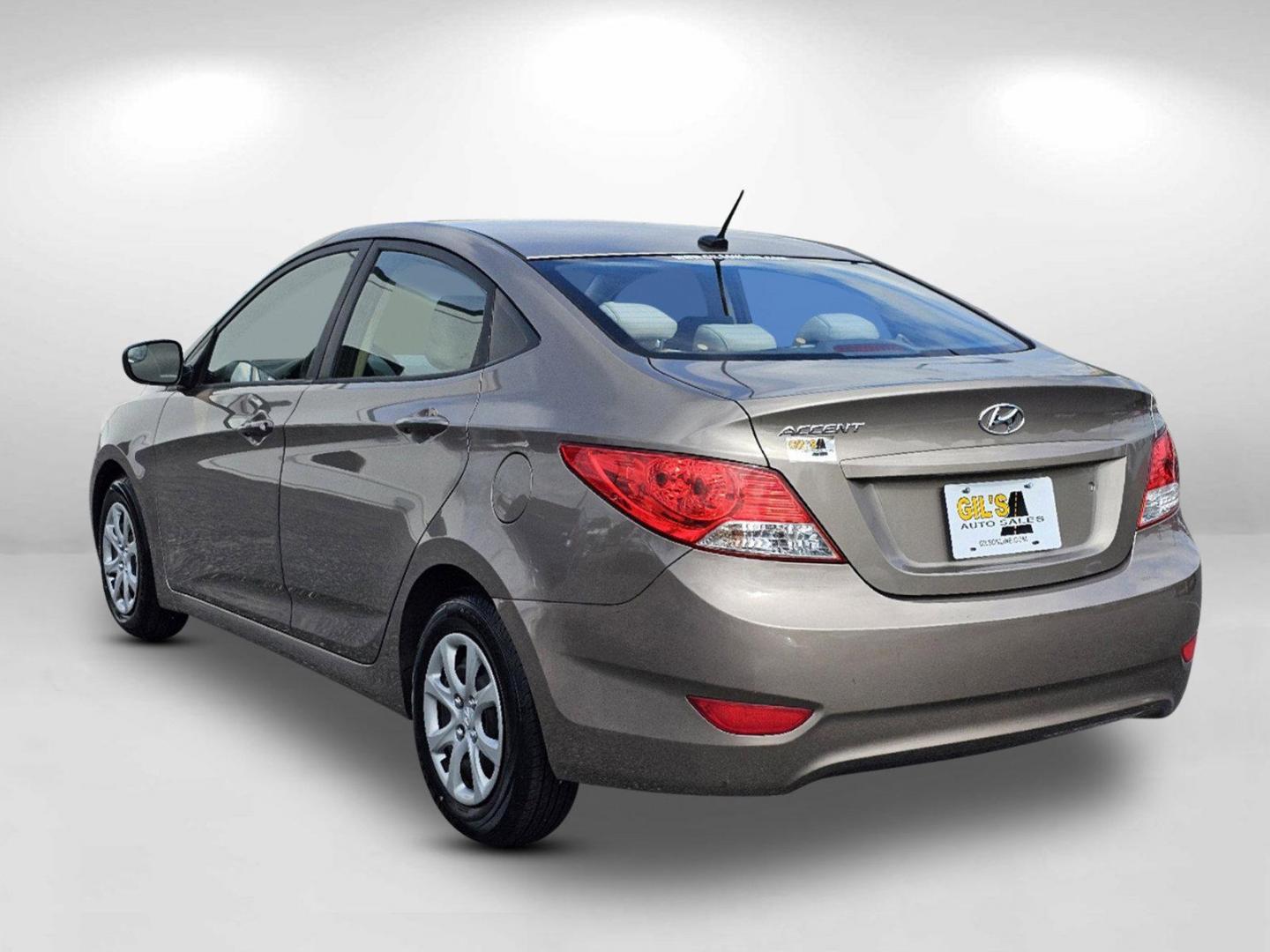 2014 Mocho Bronze Metallic /Beige Hyundai Accent GLS (KMHCT4AE4EU) with an Regular Unleaded I-4 1.6 L/97 engine, 6-Speed Automatic w/OD transmission, located at 7000 Northlake Connector, Columbus, GA, 31904, (706) 987-8085, 32.524975, -84.978134 - 2014 Hyundai Accent GLS - Photo#6