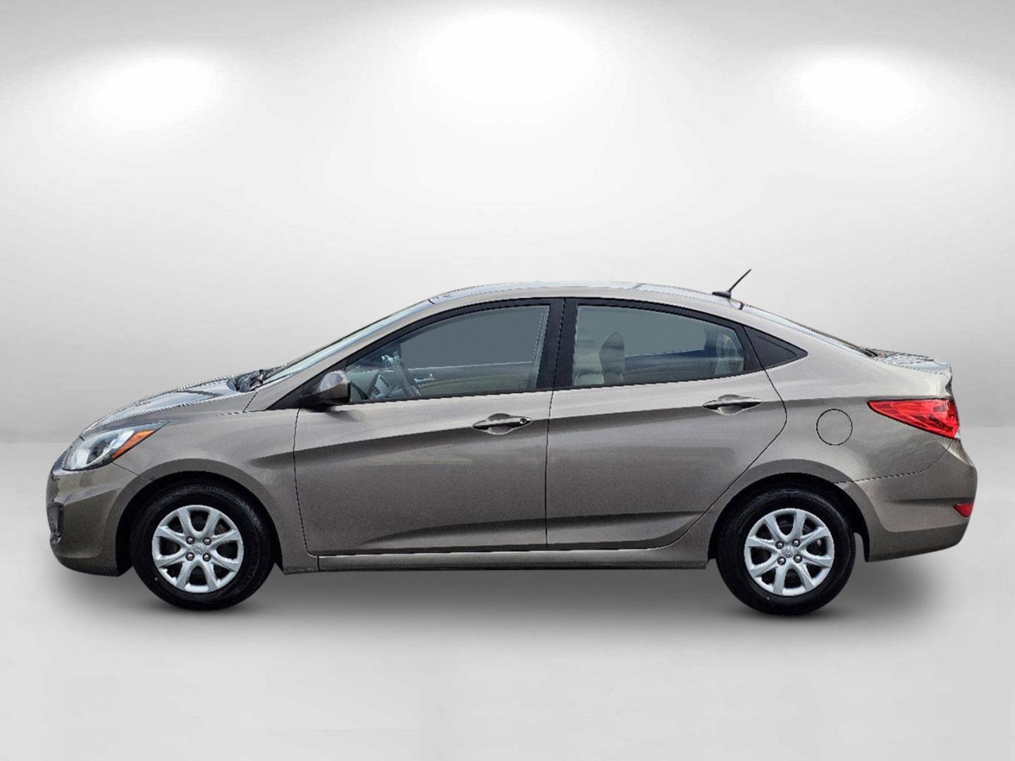 2014 Mocho Bronze Metallic /Beige Hyundai Accent GLS (KMHCT4AE4EU) with an Regular Unleaded I-4 1.6 L/97 engine, 6-Speed Automatic w/OD transmission, located at 7000 Northlake Connector, Columbus, GA, 31904, (706) 987-8085, 32.524975, -84.978134 - 2014 Hyundai Accent GLS - Photo#7