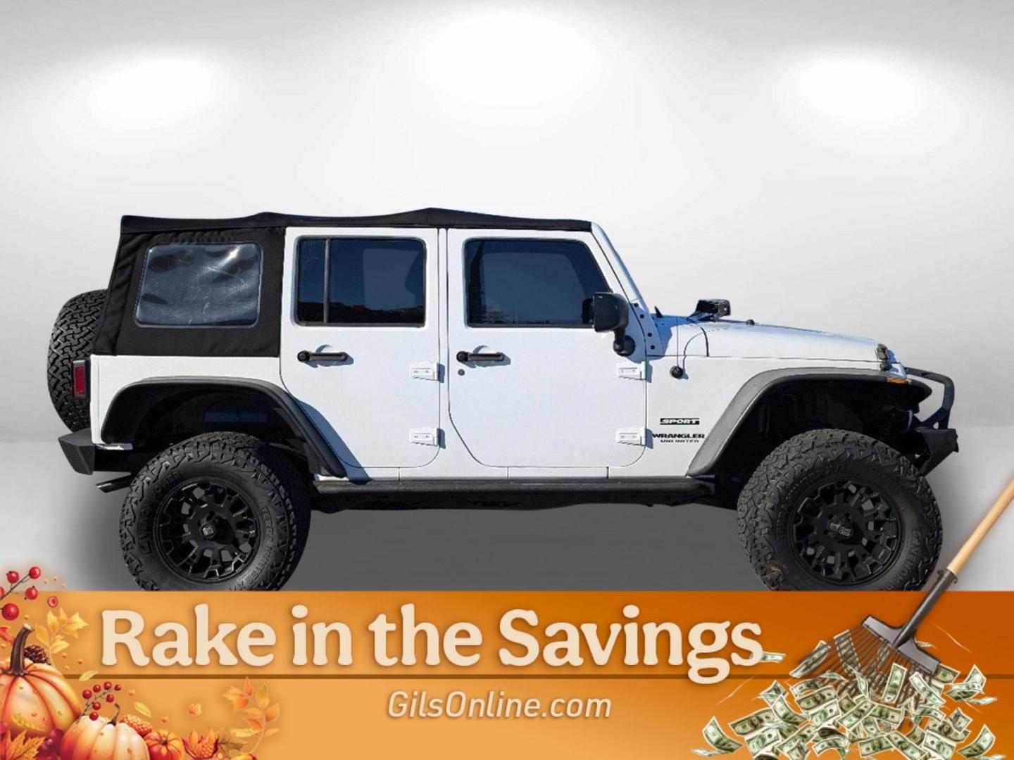 2014 Bright White Clearcoat /Black Jeep Wrangler Unlimited Sport (1C4BJWDG8EL) with an Regular Unleaded V-6 3.6 L/220 engine, 5-Speed Automatic w/OD transmission, located at 3959 U.S. 80 W, Phenix City, AL, 36870, (334) 297-4885, 32.469296, -85.135185 - 2014 Jeep Wrangler Unlimited Sport - Photo#3