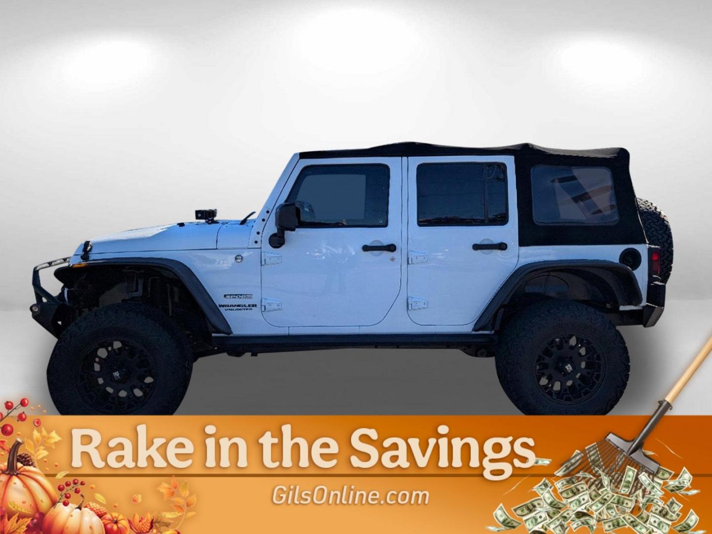 2014 Bright White Clearcoat /Black Jeep Wrangler Unlimited Sport (1C4BJWDG8EL) with an Regular Unleaded V-6 3.6 L/220 engine, 5-Speed Automatic w/OD transmission, located at 3959 U.S. 80 W, Phenix City, AL, 36870, (334) 297-4885, 32.469296, -85.135185 - 2014 Jeep Wrangler Unlimited Sport - Photo#7