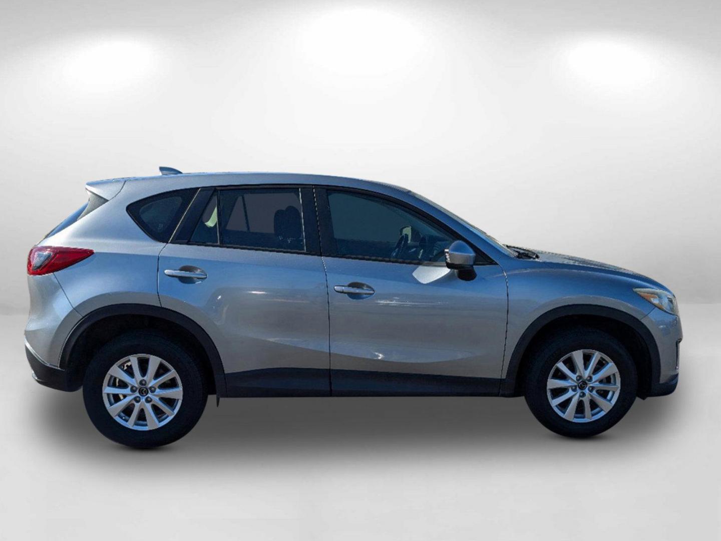 2014 Liquid Silver Metallic /Black Mazda CX-5 Sport (JM3KE2BE7E0) with an Regular Unleaded I-4 2.0 L/122 engine, 6-Speed Automatic w/OD transmission, located at 521 Old Farm Lane Rd, Prattville, AL, 36066, (334) 325-1505, 32.482460, -86.416367 - 2014 Mazda CX-5 Sport - Photo#3