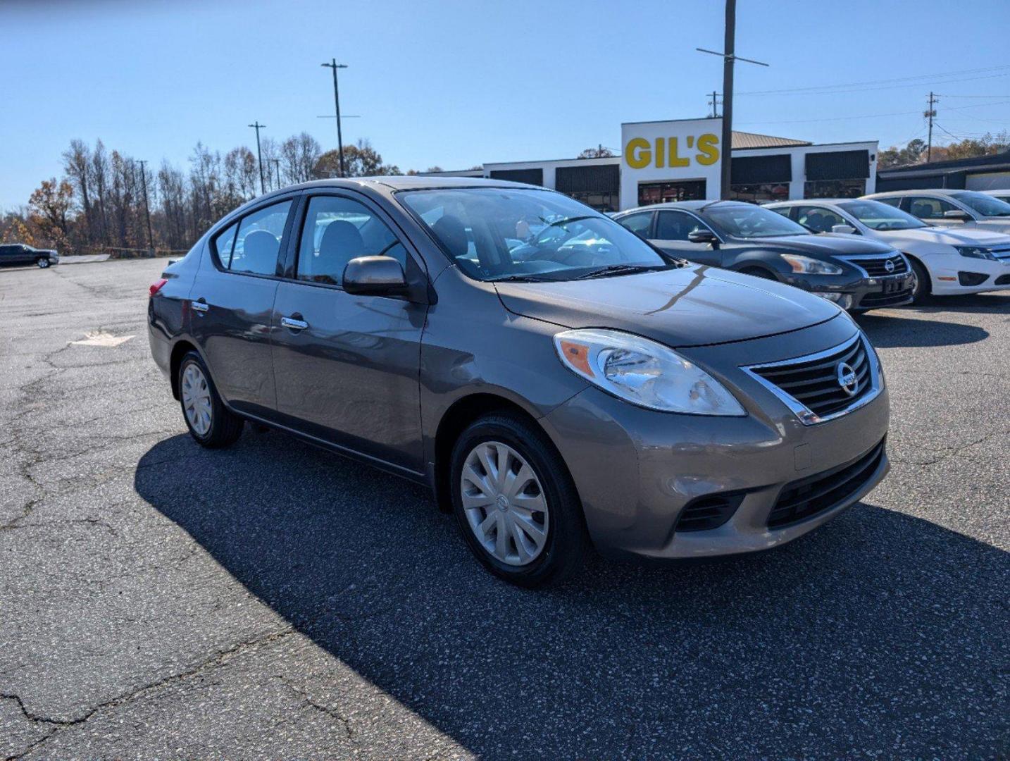 2014 /Charcoal Nissan Versa SV (3N1CN7AP9EL) with an Regular Unleaded I-4 1.6 L/98 engine, 1-Speed CVT w/OD transmission, located at 3959 U.S. 80 W, Phenix City, AL, 36870, (334) 297-4885, 32.469296, -85.135185 - 2014 Nissan Versa SV - Photo#2