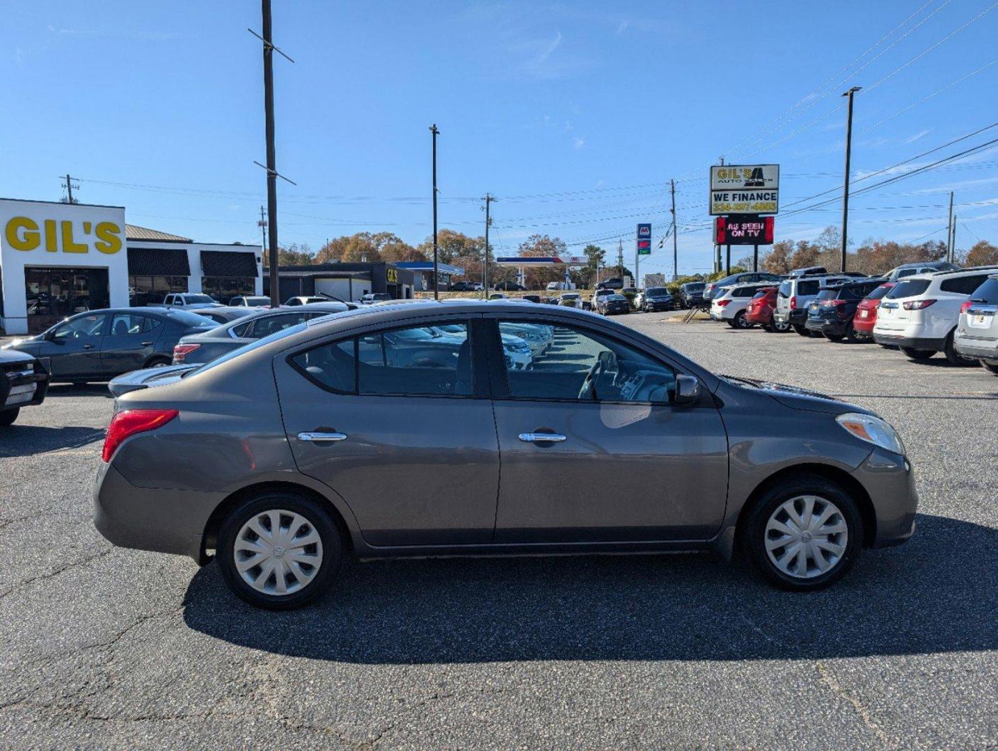 2014 /Charcoal Nissan Versa SV (3N1CN7AP9EL) with an Regular Unleaded I-4 1.6 L/98 engine, 1-Speed CVT w/OD transmission, located at 3959 U.S. 80 W, Phenix City, AL, 36870, (334) 297-4885, 32.469296, -85.135185 - 2014 Nissan Versa SV - Photo#3