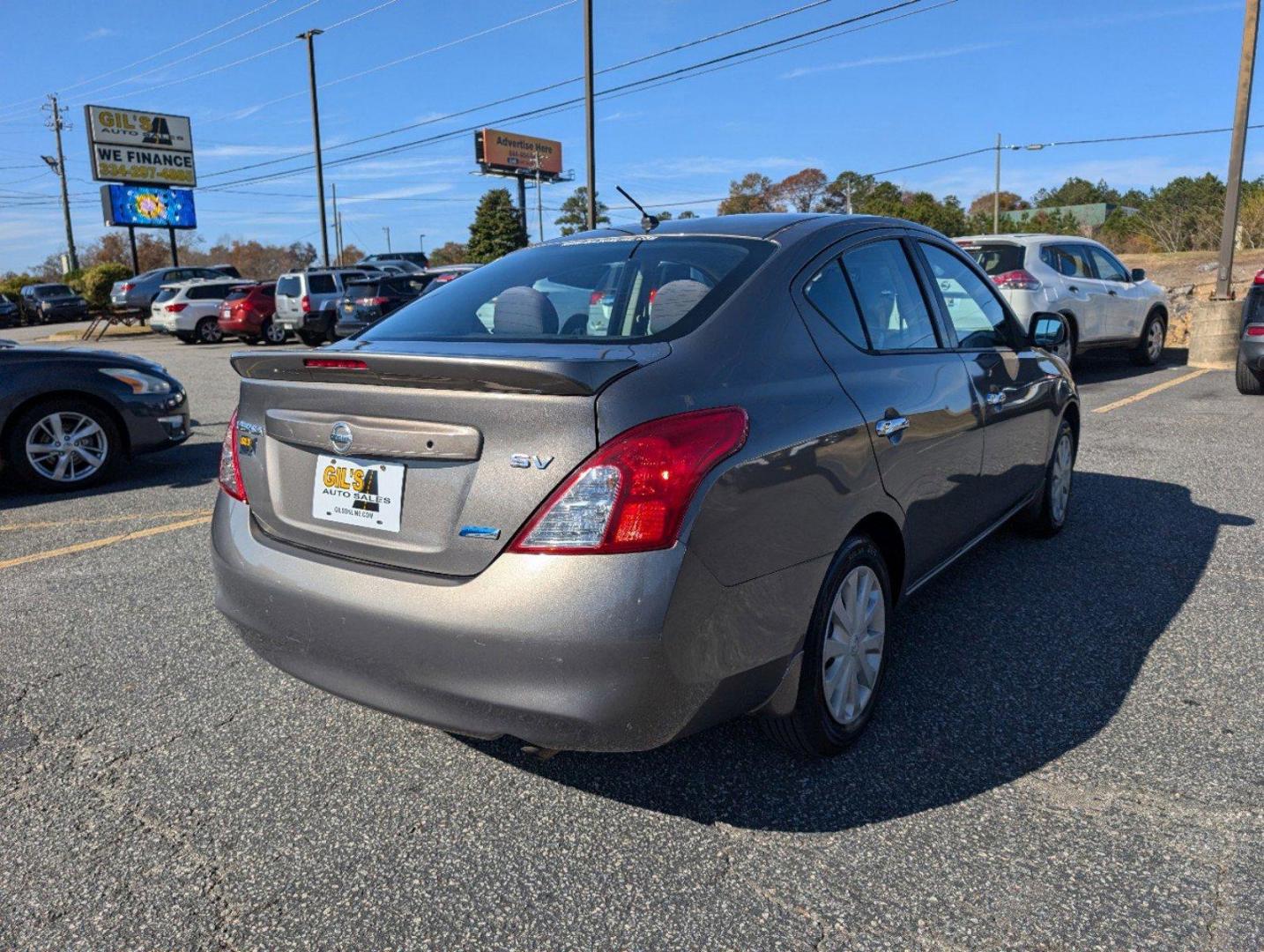 2014 /Charcoal Nissan Versa SV (3N1CN7AP9EL) with an Regular Unleaded I-4 1.6 L/98 engine, 1-Speed CVT w/OD transmission, located at 3959 U.S. 80 W, Phenix City, AL, 36870, (334) 297-4885, 32.469296, -85.135185 - 2014 Nissan Versa SV - Photo#4