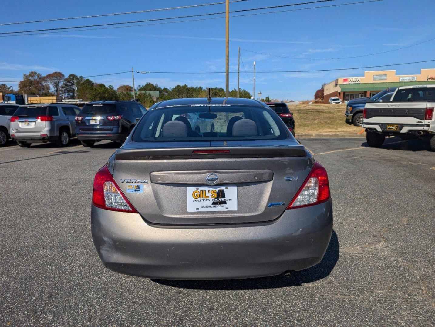 2014 /Charcoal Nissan Versa SV (3N1CN7AP9EL) with an Regular Unleaded I-4 1.6 L/98 engine, 1-Speed CVT w/OD transmission, located at 3959 U.S. 80 W, Phenix City, AL, 36870, (334) 297-4885, 32.469296, -85.135185 - 2014 Nissan Versa SV - Photo#5