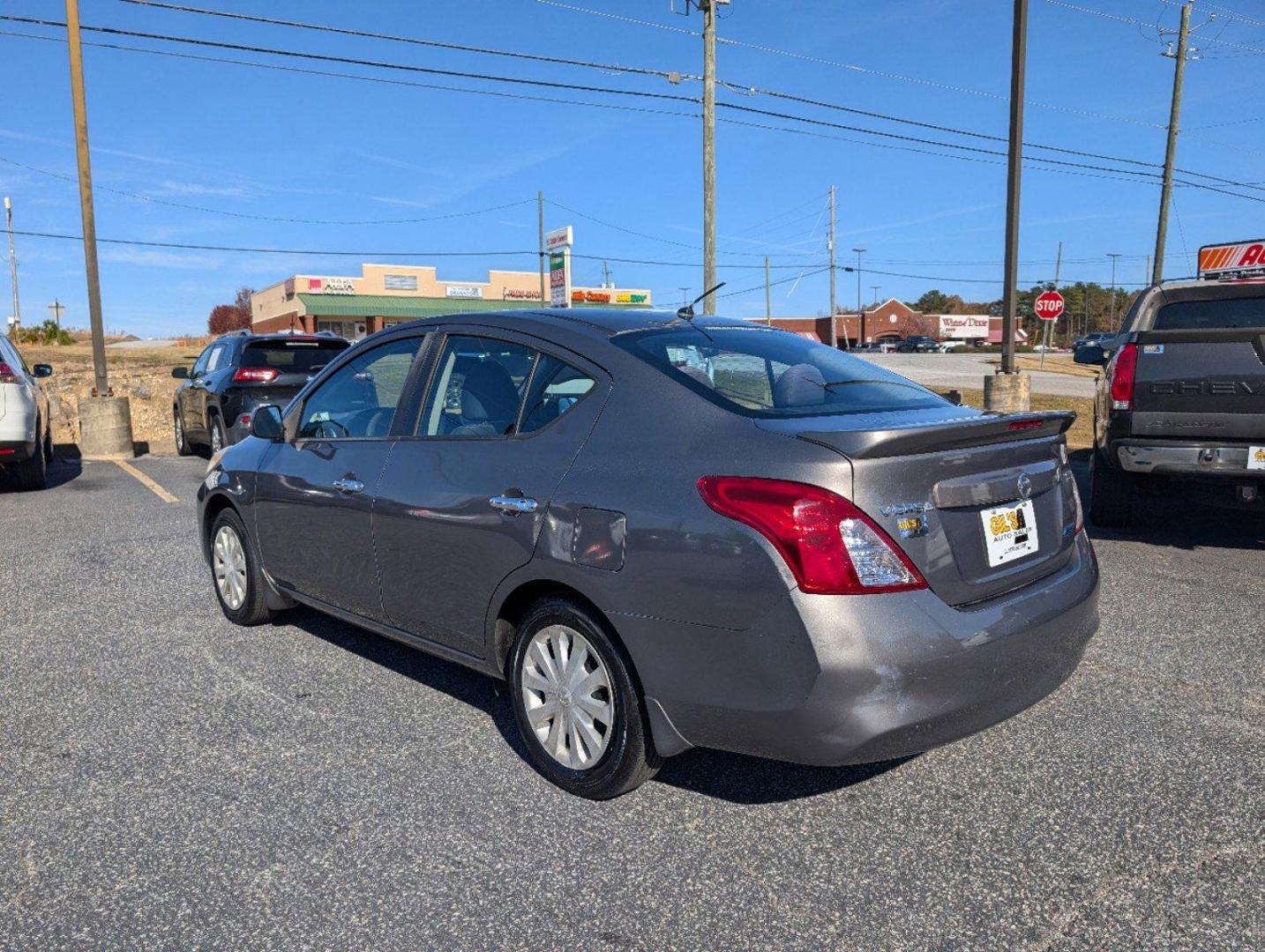 2014 /Charcoal Nissan Versa SV (3N1CN7AP9EL) with an Regular Unleaded I-4 1.6 L/98 engine, 1-Speed CVT w/OD transmission, located at 3959 U.S. 80 W, Phenix City, AL, 36870, (334) 297-4885, 32.469296, -85.135185 - 2014 Nissan Versa SV - Photo#6