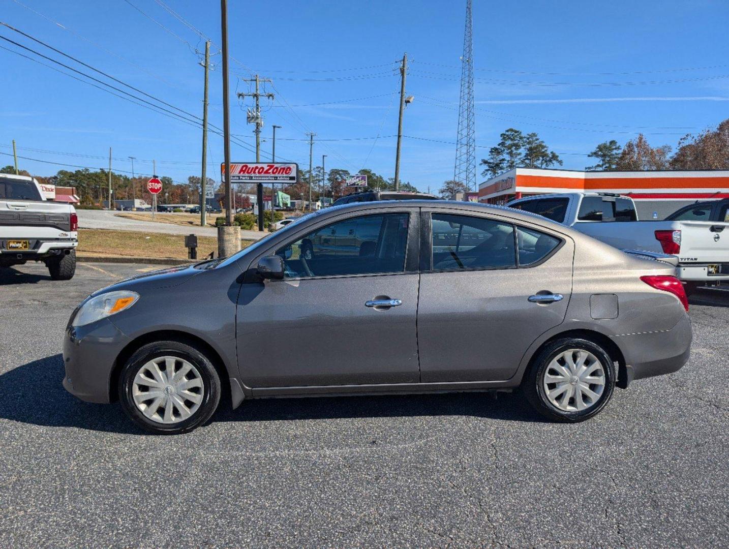 2014 /Charcoal Nissan Versa SV (3N1CN7AP9EL) with an Regular Unleaded I-4 1.6 L/98 engine, 1-Speed CVT w/OD transmission, located at 3959 U.S. 80 W, Phenix City, AL, 36870, (334) 297-4885, 32.469296, -85.135185 - 2014 Nissan Versa SV - Photo#7