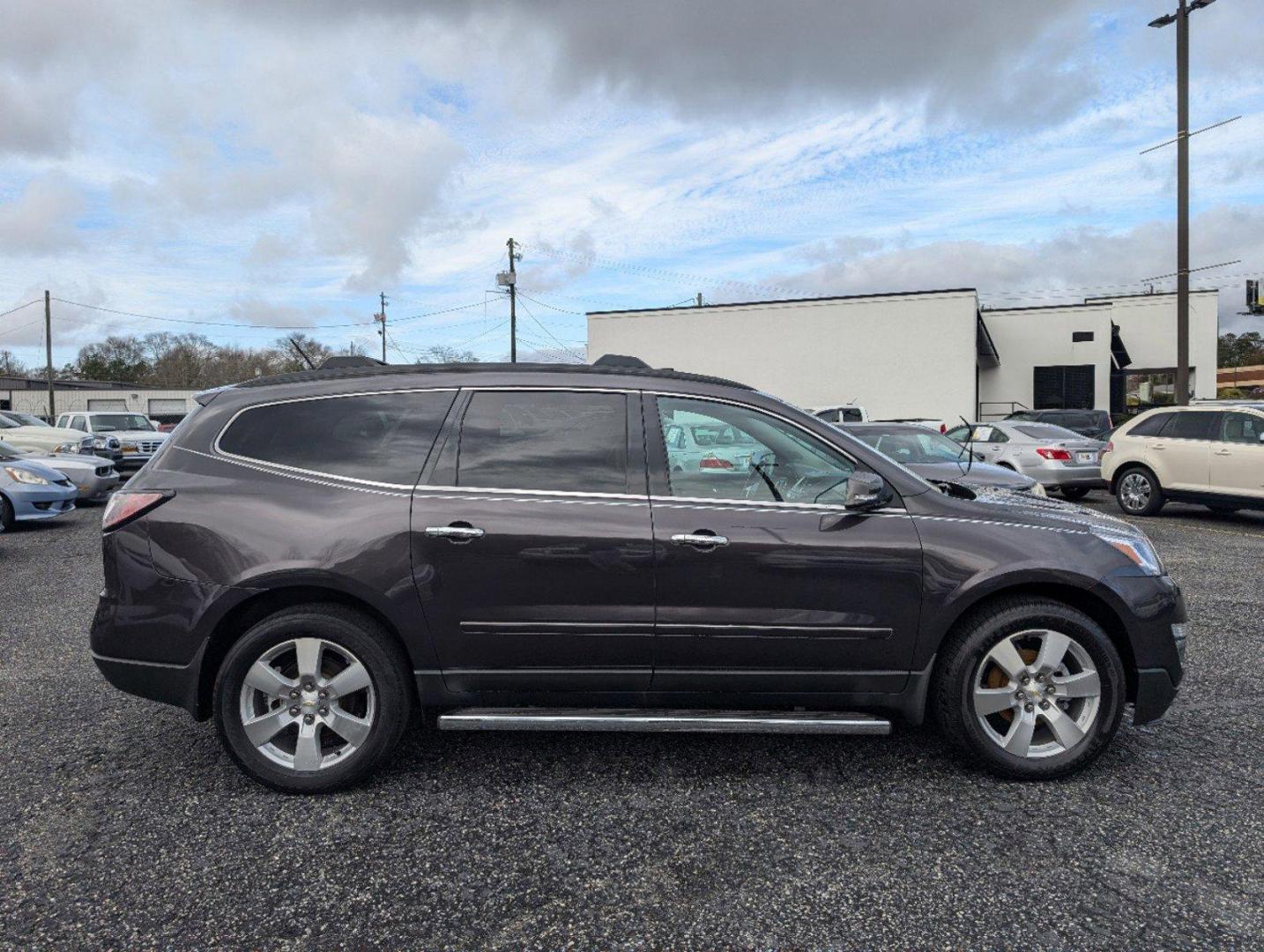 2015 /Ebony Chevrolet Traverse LTZ (1GNKRJKD8FJ) with an Gas V6 3.6L/217 engine, 6-Speed Automatic transmission, located at 3959 U.S. 80 W, Phenix City, AL, 36870, (334) 297-4885, 32.469296, -85.135185 - 2015 Chevrolet Traverse LTZ - Photo#3