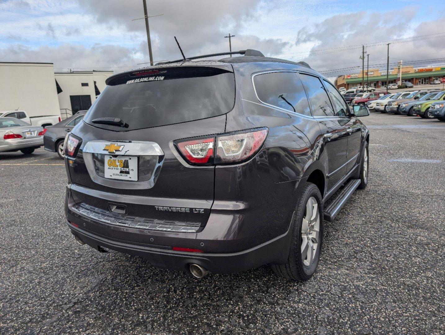 2015 /Ebony Chevrolet Traverse LTZ (1GNKRJKD8FJ) with an Gas V6 3.6L/217 engine, 6-Speed Automatic transmission, located at 3959 U.S. 80 W, Phenix City, AL, 36870, (334) 297-4885, 32.469296, -85.135185 - 2015 Chevrolet Traverse LTZ - Photo#4