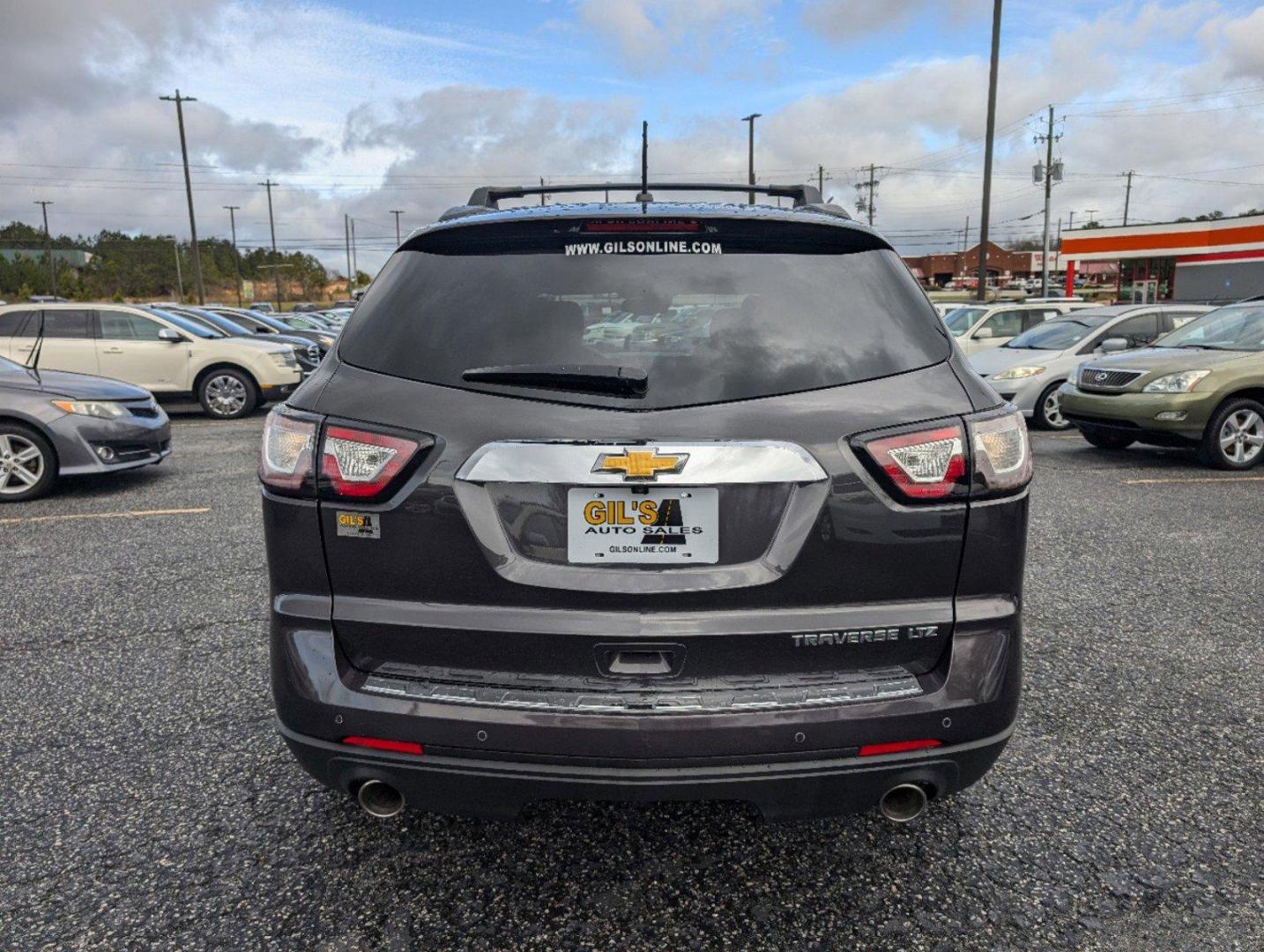 2015 /Ebony Chevrolet Traverse LTZ (1GNKRJKD8FJ) with an Gas V6 3.6L/217 engine, 6-Speed Automatic transmission, located at 3959 U.S. 80 W, Phenix City, AL, 36870, (334) 297-4885, 32.469296, -85.135185 - 2015 Chevrolet Traverse LTZ - Photo#5