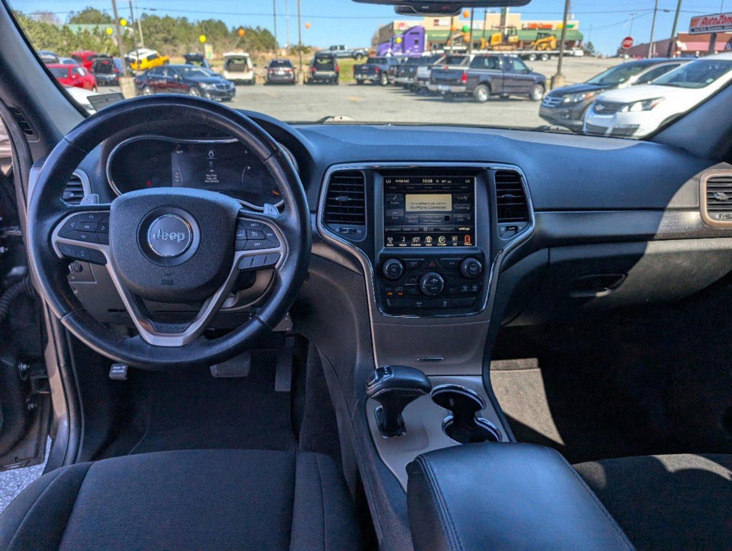 2015 /Black Jeep Grand Cherokee Laredo (1C4RJFAG7FC) with an Regular Unleaded V-6 3.6 L/220 engine, 8-Speed Automatic w/OD transmission, located at 3959 U.S. 80 W, Phenix City, AL, 36870, (334) 297-4885, 32.469296, -85.135185 - 2015 Jeep Grand Cherokee Laredo - Photo#11