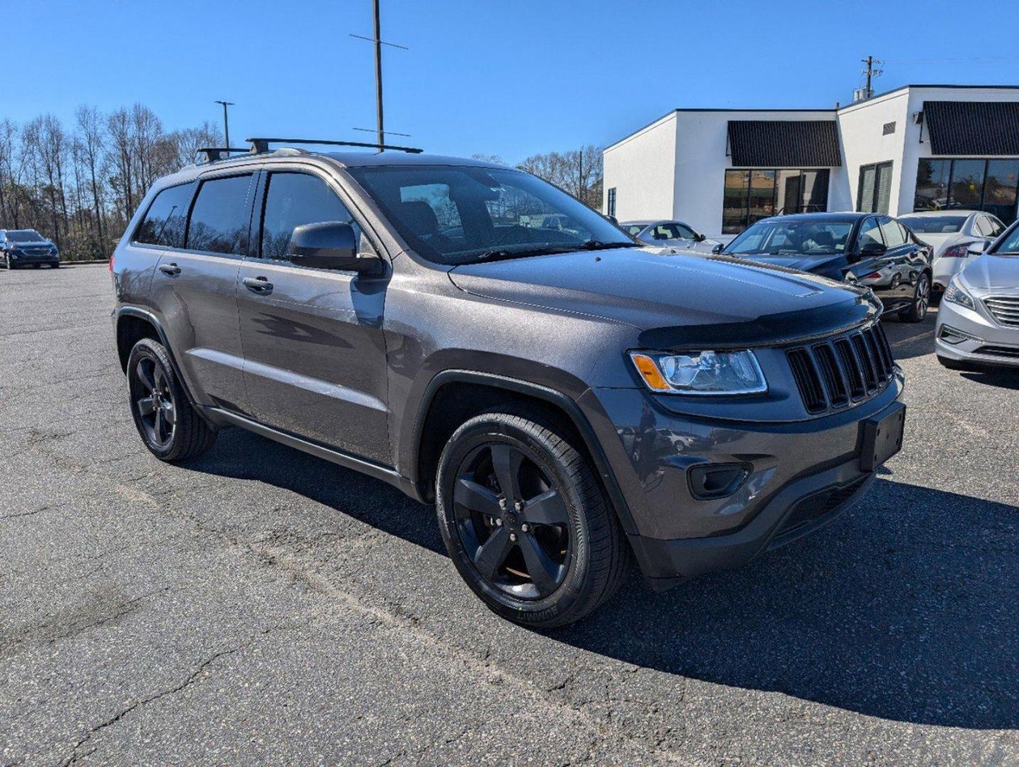 2015 /Black Jeep Grand Cherokee Laredo (1C4RJFAG7FC) with an Regular Unleaded V-6 3.6 L/220 engine, 8-Speed Automatic w/OD transmission, located at 3959 U.S. 80 W, Phenix City, AL, 36870, (334) 297-4885, 32.469296, -85.135185 - 2015 Jeep Grand Cherokee Laredo - Photo#2