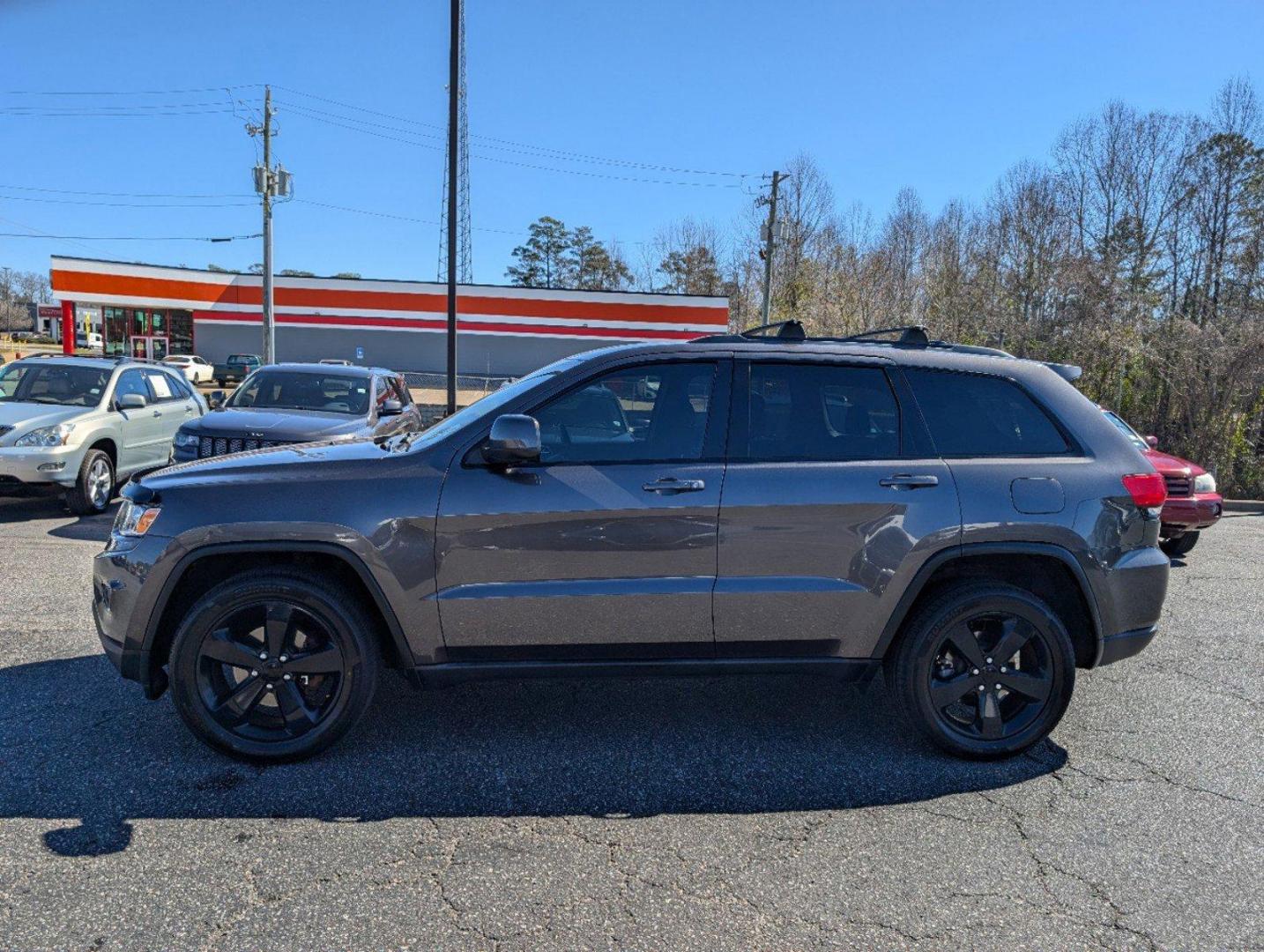 2015 /Black Jeep Grand Cherokee Laredo (1C4RJFAG7FC) with an Regular Unleaded V-6 3.6 L/220 engine, 8-Speed Automatic w/OD transmission, located at 3959 U.S. 80 W, Phenix City, AL, 36870, (334) 297-4885, 32.469296, -85.135185 - 2015 Jeep Grand Cherokee Laredo - Photo#7