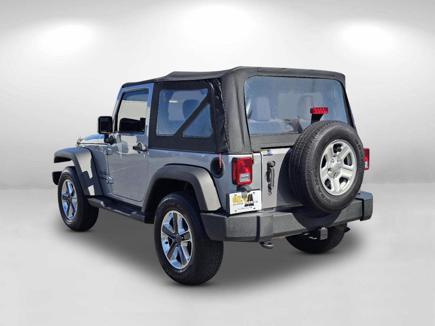 2015 Billet Silver Metallic Clearcoat /Black Jeep Wrangler Sport (1C4AJWAG2FL) with an Regular Unleaded V-6 3.6 L/220 engine, 5-Speed Automatic w/OD transmission, located at 5115 14th Ave., Columbus, GA, 31904, (706) 323-0345, 32.511494, -84.971046 - 2015 Jeep Wrangler Sport - Photo#6