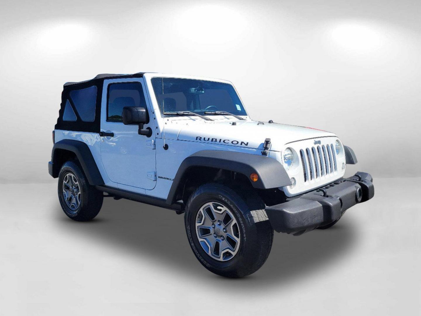 2015 Bright White Clearcoat /Black Jeep Wrangler Rubicon (1C4BJWCG4FL) with an Regular Unleaded V-6 3.6 L/220 engine, 5-Speed Automatic w/OD transmission, located at 804 22nd Ave, Phenix City, AL, 36870, (334) 297-1860, 32.484749, -85.024475 - 2015 Jeep Wrangler Rubicon - Photo#2