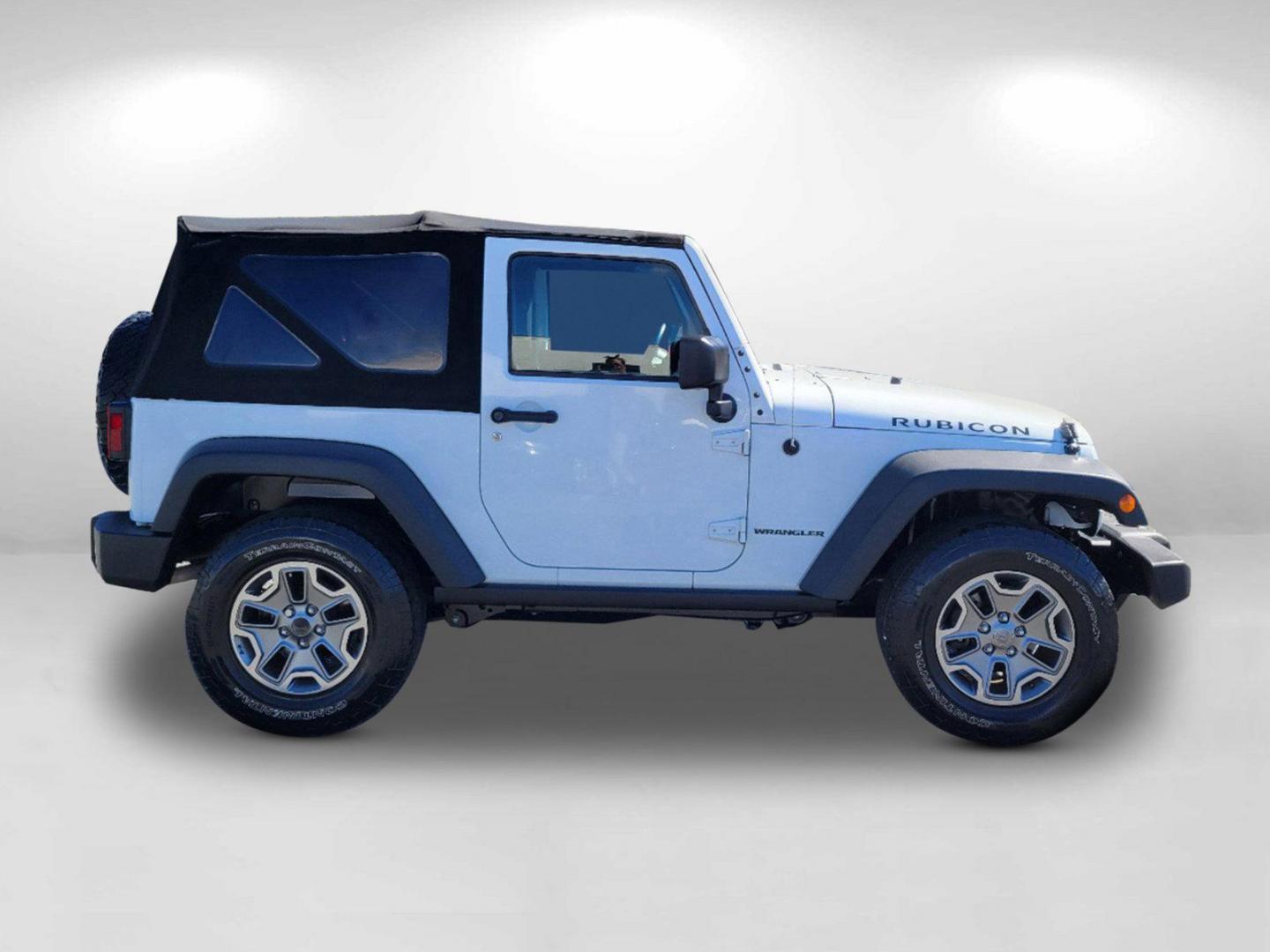 2015 Bright White Clearcoat /Black Jeep Wrangler Rubicon (1C4BJWCG4FL) with an Regular Unleaded V-6 3.6 L/220 engine, 5-Speed Automatic w/OD transmission, located at 804 22nd Ave, Phenix City, AL, 36870, (334) 297-1860, 32.484749, -85.024475 - 2015 Jeep Wrangler Rubicon - Photo#3