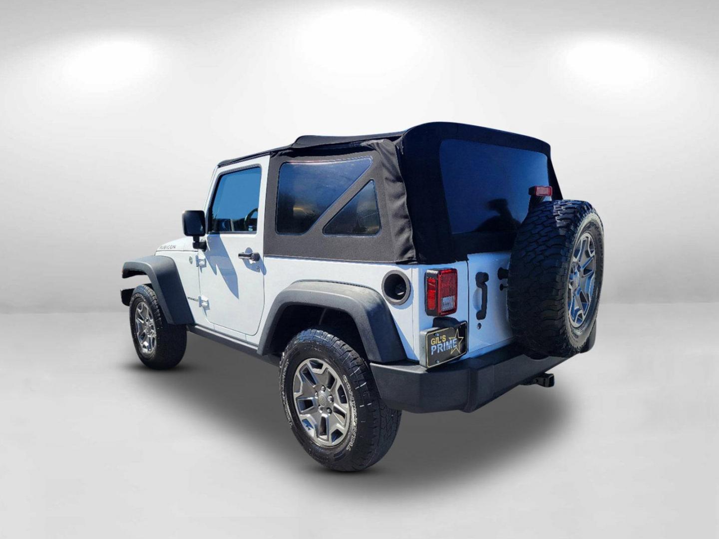 2015 Bright White Clearcoat /Black Jeep Wrangler Rubicon (1C4BJWCG4FL) with an Regular Unleaded V-6 3.6 L/220 engine, 5-Speed Automatic w/OD transmission, located at 804 22nd Ave, Phenix City, AL, 36870, (334) 297-1860, 32.484749, -85.024475 - 2015 Jeep Wrangler Rubicon - Photo#6