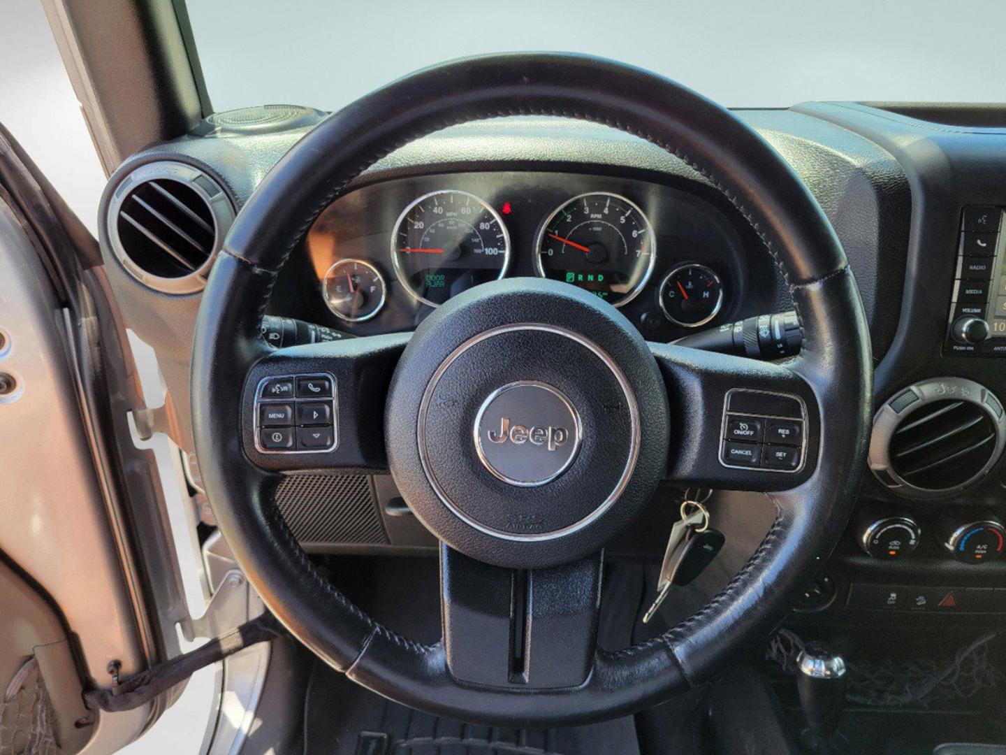 2015 Billet Silver Metallic Clearcoat /Black Jeep Wrangler Unlimited Sport (1C4HJWDG2FL) with an Regular Unleaded V-6 3.6 L/220 engine, 5-Speed Automatic w/OD transmission, located at 7000 Northlake Connector, Columbus, GA, 31904, (706) 987-8085, 32.524975, -84.978134 - 2015 Jeep Wrangler Unlimited Sport - Photo#11