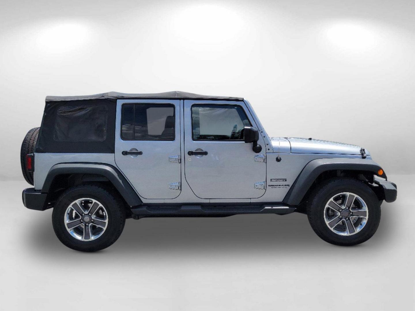 2015 Billet Silver Metallic Clearcoat /Black Jeep Wrangler Unlimited Sport (1C4HJWDG2FL) with an Regular Unleaded V-6 3.6 L/220 engine, 5-Speed Automatic w/OD transmission, located at 7000 Northlake Connector, Columbus, GA, 31904, (706) 987-8085, 32.524975, -84.978134 - 2015 Jeep Wrangler Unlimited Sport - Photo#3