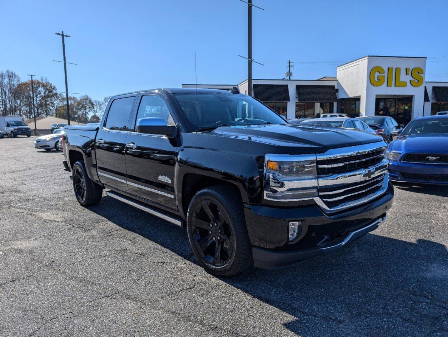 2016 /Saddle Chevrolet Silverado 1500 High Country (3GCPCTEJXGG) with an Gas V8 6.2L/376 engine, 8-Speed Automatic transmission, located at 3959 U.S. 80 W, Phenix City, AL, 36870, (334) 297-4885, 32.469296, -85.135185 - 2016 Chevrolet Silverado 1500 High Country - Photo#2