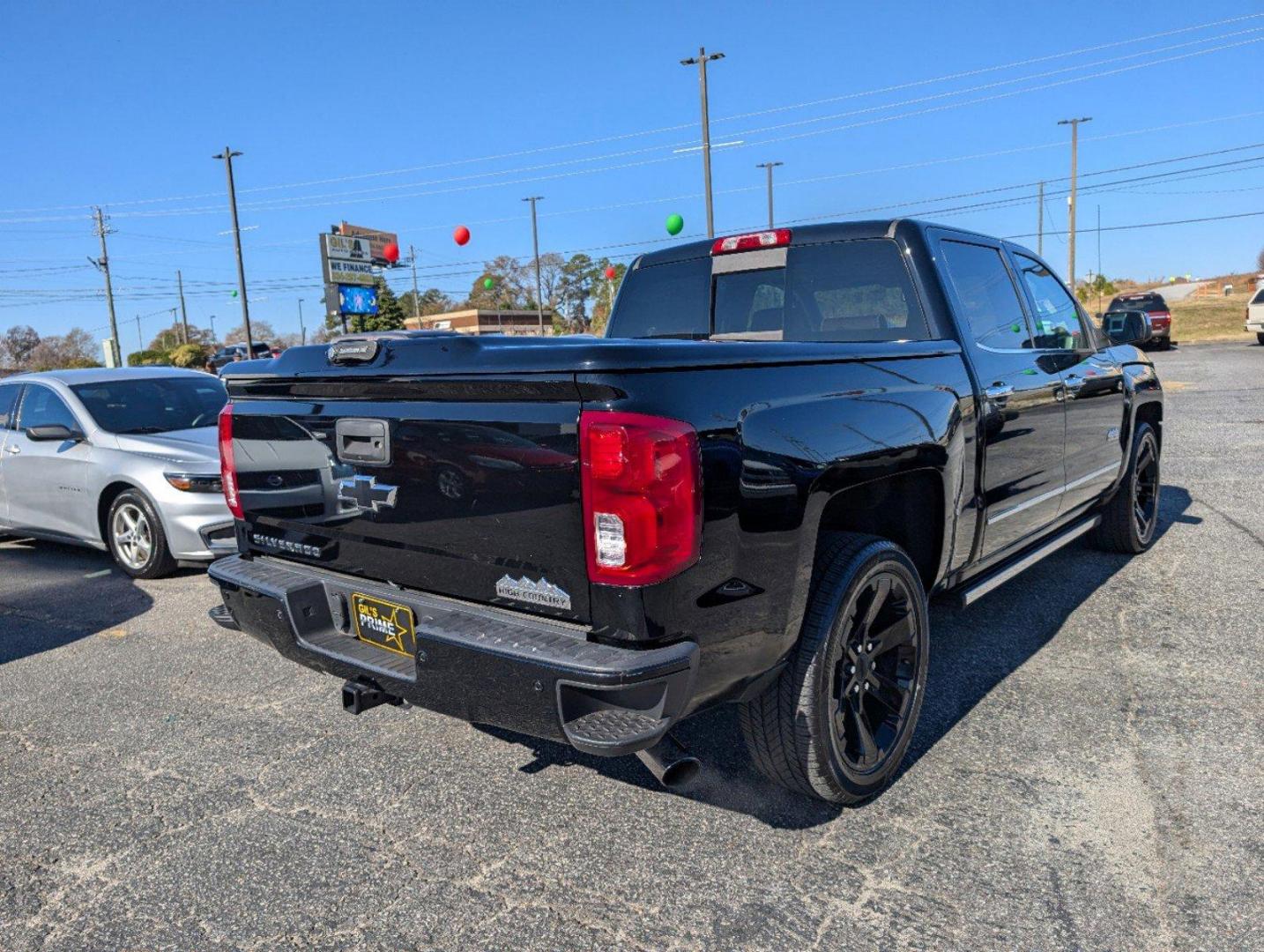 2016 /Saddle Chevrolet Silverado 1500 High Country (3GCPCTEJXGG) with an Gas V8 6.2L/376 engine, 8-Speed Automatic transmission, located at 3959 U.S. 80 W, Phenix City, AL, 36870, (334) 297-4885, 32.469296, -85.135185 - 2016 Chevrolet Silverado 1500 High Country - Photo#4