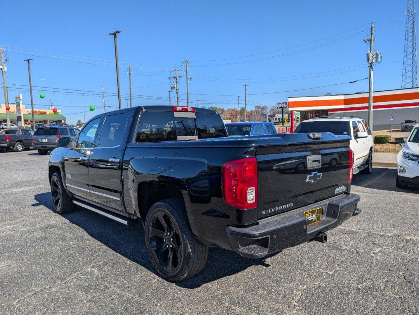 2016 /Saddle Chevrolet Silverado 1500 High Country (3GCPCTEJXGG) with an Gas V8 6.2L/376 engine, 8-Speed Automatic transmission, located at 3959 U.S. 80 W, Phenix City, AL, 36870, (334) 297-4885, 32.469296, -85.135185 - 2016 Chevrolet Silverado 1500 High Country - Photo#6