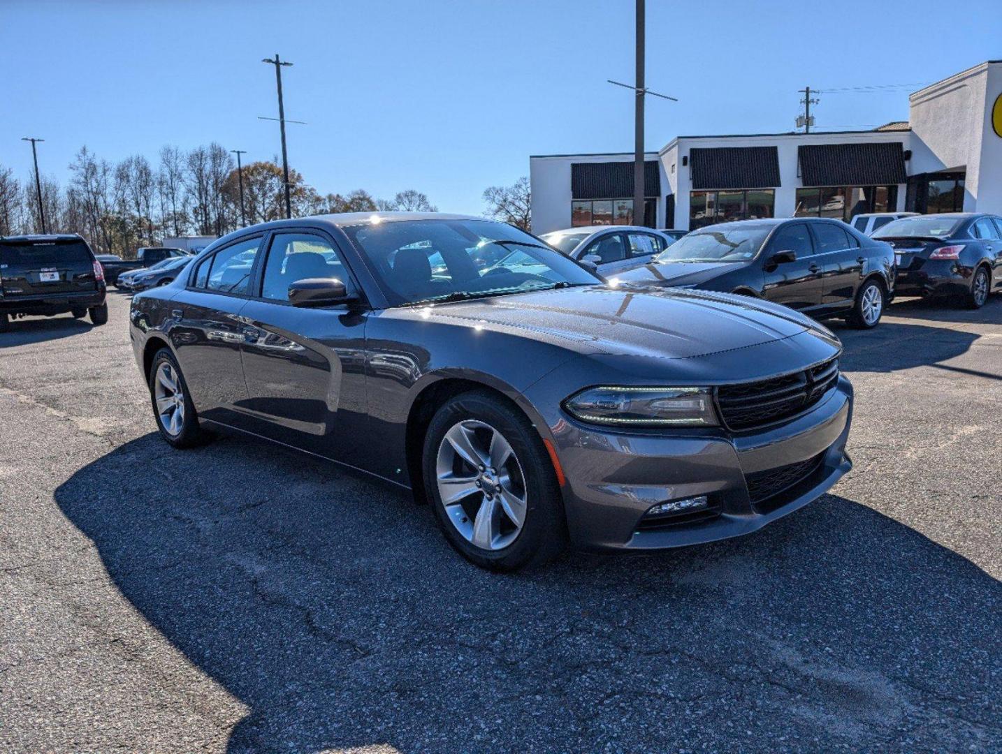 2016 /Tungsten/Black Dodge Charger SXT (2C3CDXHG8GH) with an Regular Unleaded V-6 3.6 L/220 engine, 8-Speed Automatic w/OD transmission, located at 3959 U.S. 80 W, Phenix City, AL, 36870, (334) 297-4885, 32.469296, -85.135185 - 2016 Dodge Charger SXT - Photo#2