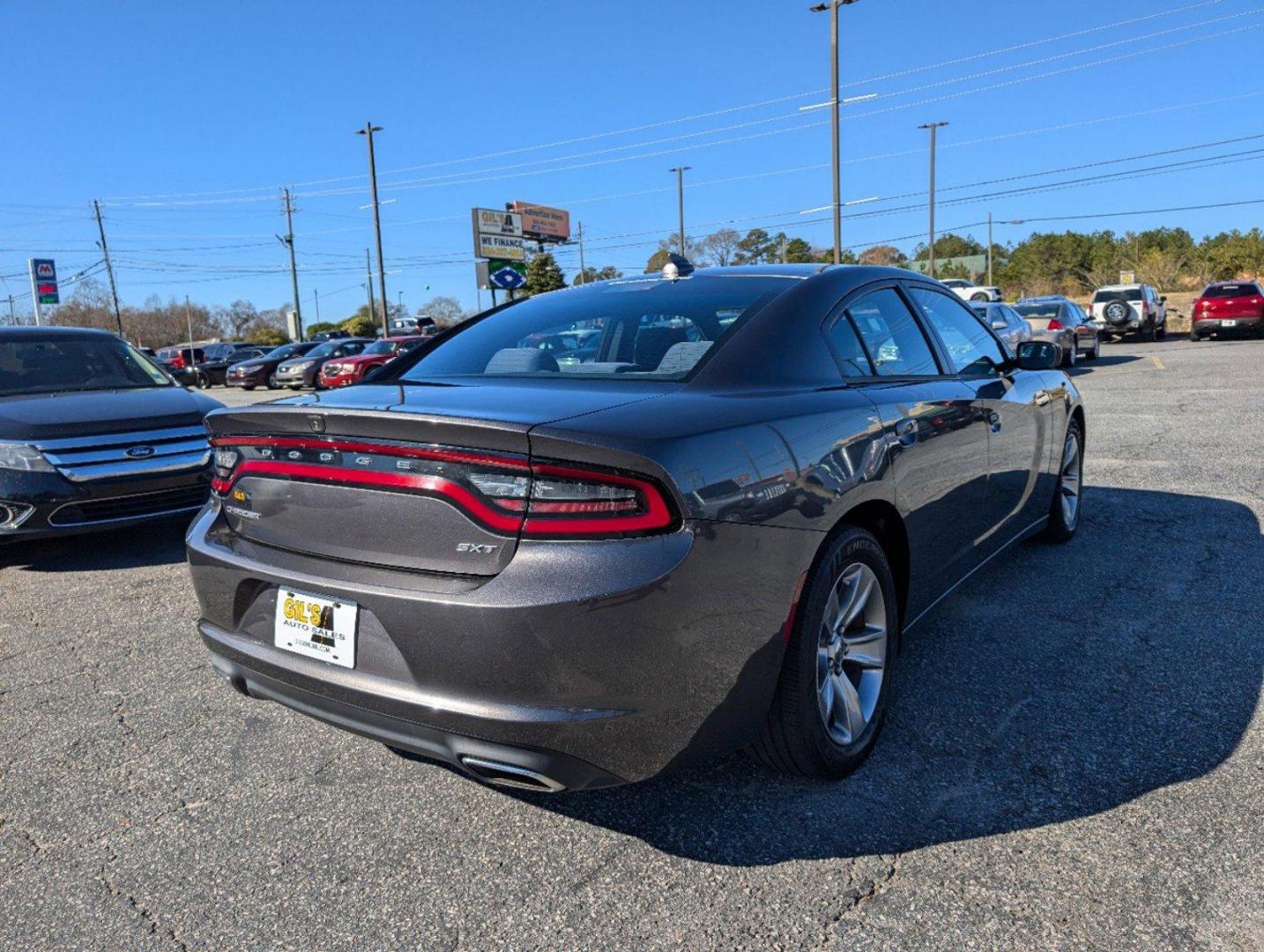 2016 /Tungsten/Black Dodge Charger SXT (2C3CDXHG8GH) with an Regular Unleaded V-6 3.6 L/220 engine, 8-Speed Automatic w/OD transmission, located at 3959 U.S. 80 W, Phenix City, AL, 36870, (334) 297-4885, 32.469296, -85.135185 - 2016 Dodge Charger SXT - Photo#4