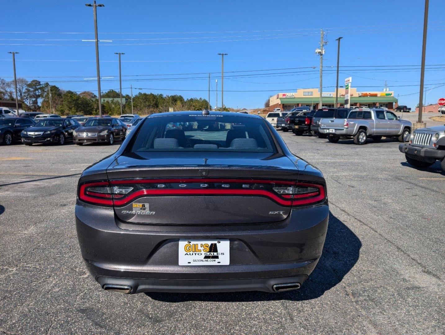 2016 /Tungsten/Black Dodge Charger SXT (2C3CDXHG8GH) with an Regular Unleaded V-6 3.6 L/220 engine, 8-Speed Automatic w/OD transmission, located at 3959 U.S. 80 W, Phenix City, AL, 36870, (334) 297-4885, 32.469296, -85.135185 - 2016 Dodge Charger SXT - Photo#5