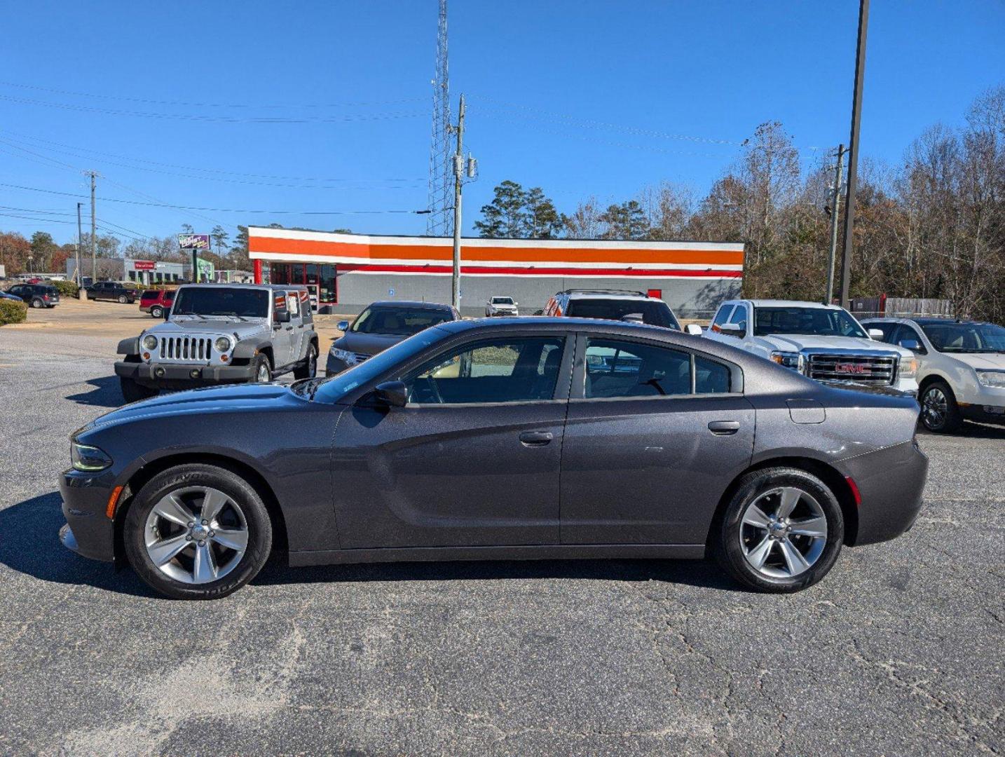 2016 /Tungsten/Black Dodge Charger SXT (2C3CDXHG8GH) with an Regular Unleaded V-6 3.6 L/220 engine, 8-Speed Automatic w/OD transmission, located at 3959 U.S. 80 W, Phenix City, AL, 36870, (334) 297-4885, 32.469296, -85.135185 - 2016 Dodge Charger SXT - Photo#7