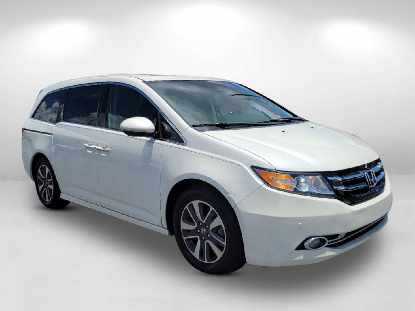 2016 White Honda Odyssey Touring Elite (5FNRL5H96GB) with an Regular Unleaded V-6 3.5 L/212 engine, 6-Speed Automatic w/OD transmission, located at 1430 Gateway Drive, Opelika, AL, 36801, (334) 239-0944, 32.637871, -85.409790 - 2016 Honda Odyssey Touring Elite - Photo#1